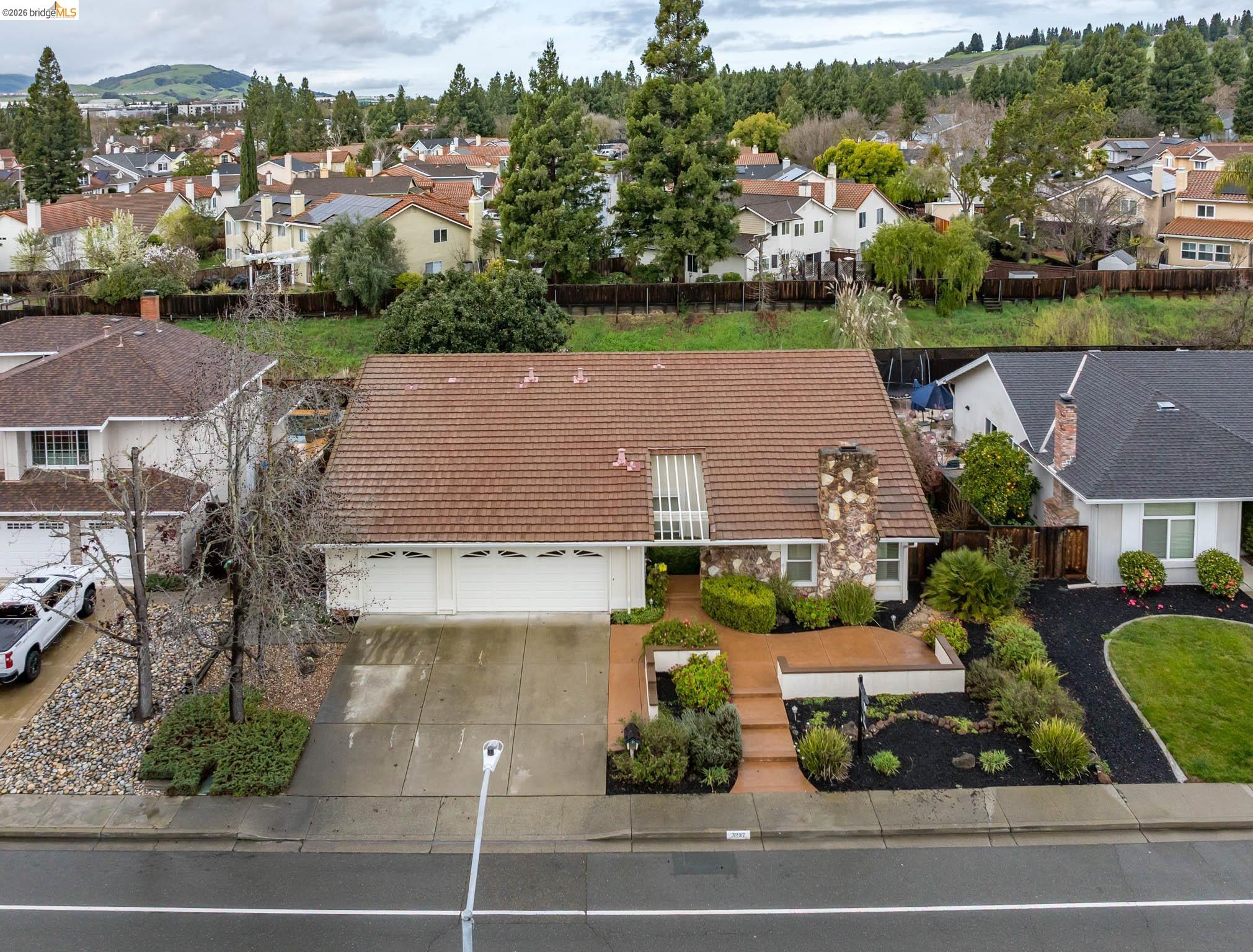 3237 Veracruz Drive San Ramon, CA 94583 - Photo 5 of 59 an aerial view of multiple houses with a yard