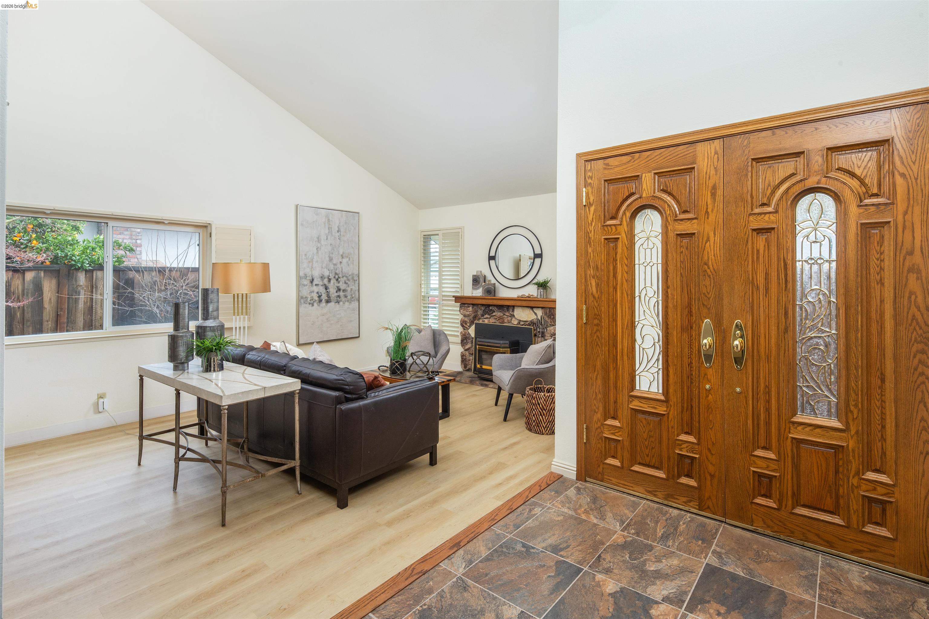 3237 Veracruz Drive San Ramon, CA 94583 - Photo 7 of 59 a living room with furniture a large window and wooden floor