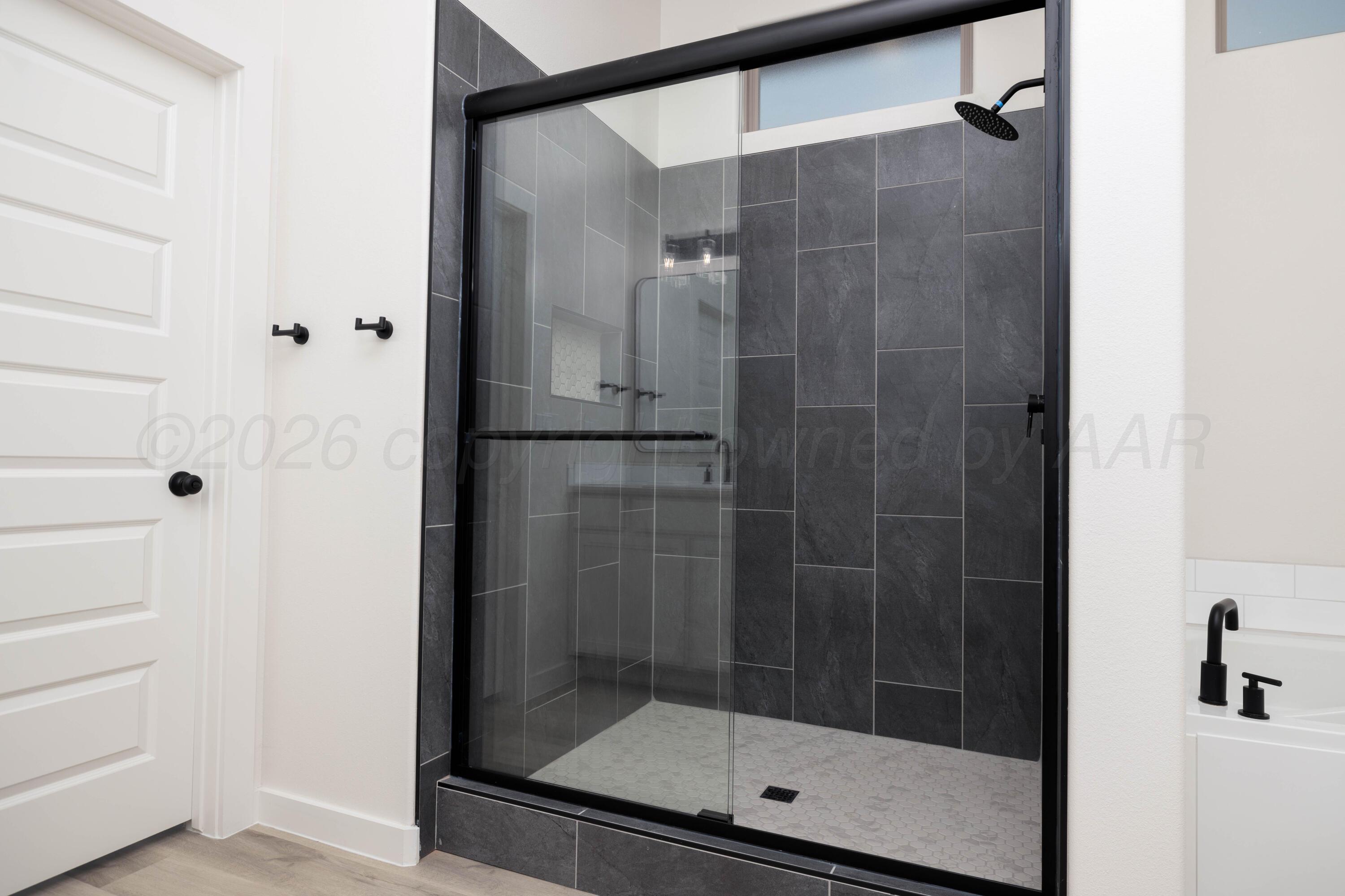 3005 Frontier Lane Amarillo, TX 79124 - Photo 6 of 15 a bathroom with a shower