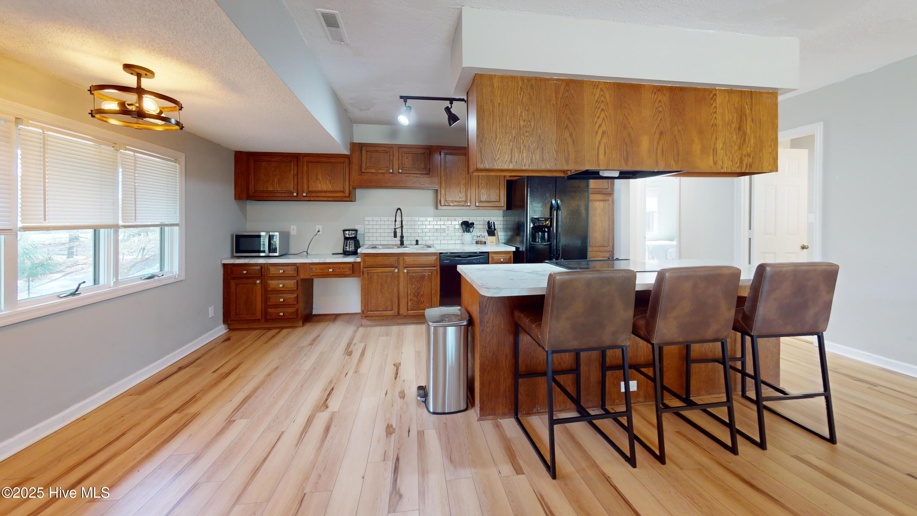 602 Dover Street Southern Pines, NC 28387 - Photo 13 of 32 602-Dover-Street-Kitchen