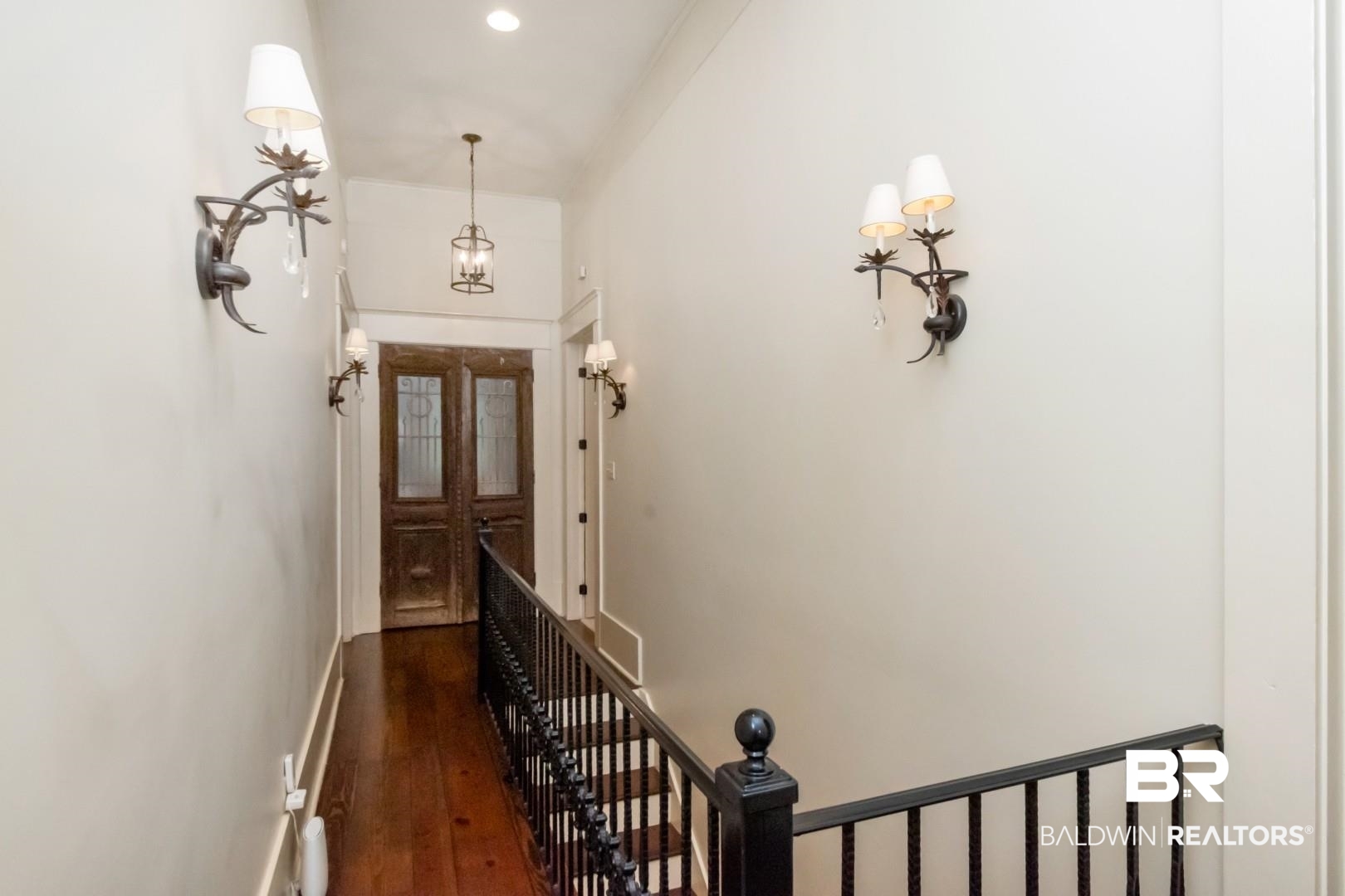4810 Mums Court Mobile, AL 36608 - Photo 28 of 50 Stairway with wood-type flooring and baseboards