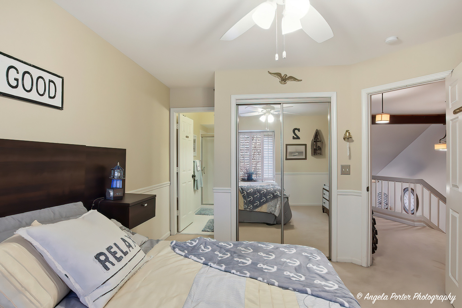 890 Shoreline Road Lake Barrington, IL 60010 - Photo 20 of 42 a bedroom with a bed and a large mirror