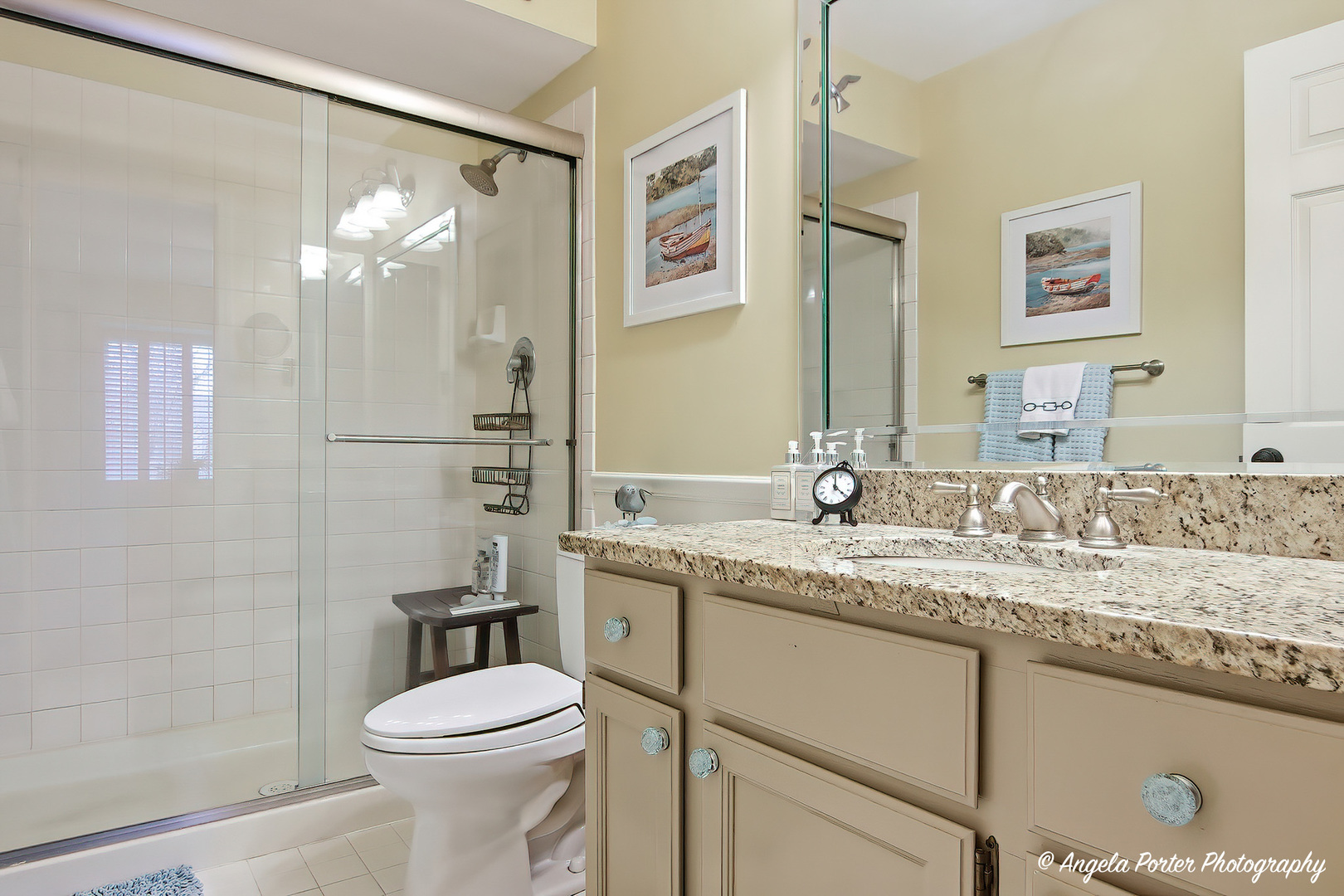 890 Shoreline Road Lake Barrington, IL 60010 - Photo 22 of 42 a bathroom with a granite countertop sink toilet and shower
