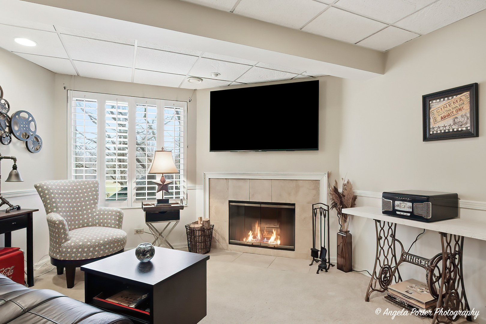 890 Shoreline Road Lake Barrington, IL 60010 - Photo 26 of 42 a living room with furniture a fireplace and a flat screen tv