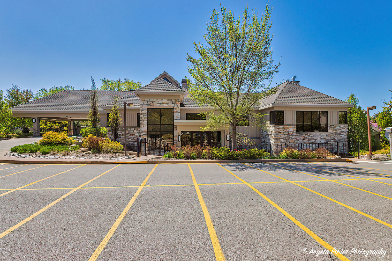 890 Shoreline Road Lake Barrington, IL 60010 - Photo 40 of 42 a front view of a house with a yard and potted plants