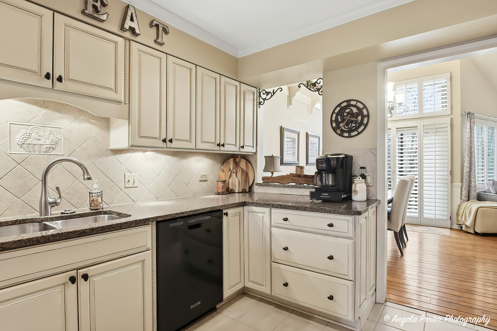 890 Shoreline Road Lake Barrington, IL 60010 - Photo 6 of 42 a kitchen with cabinets appliances and a window