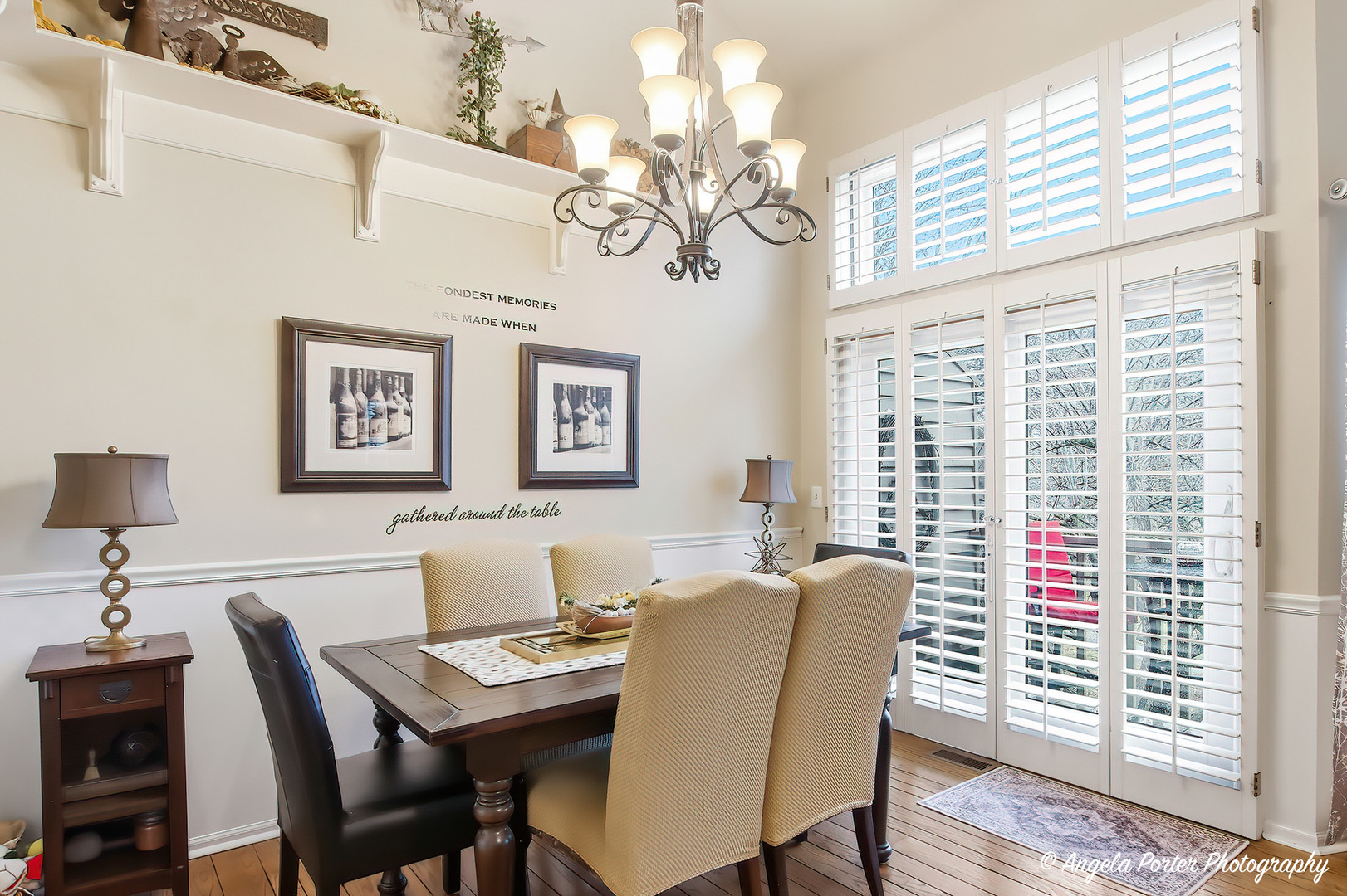 890 Shoreline Road Lake Barrington, IL 60010 - Photo 9 of 42 a view of a dining room with furniture window and wooden floor