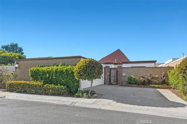 front view of a house with a street