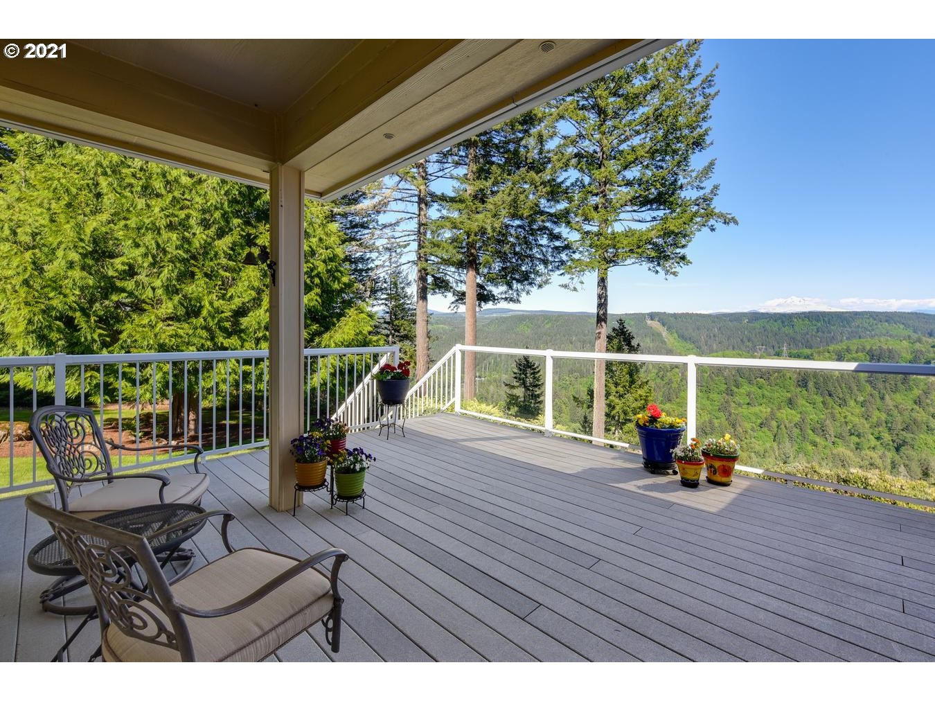 38636 Southeast Hudson Road Sandy, OR 97055 - Photo 11 of 32 a view of roof deck with lawn chairs potted plants with wooden floor