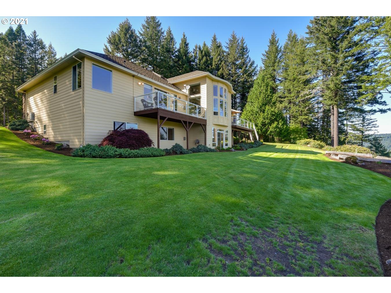 38636 Southeast Hudson Road Sandy, OR 97055 - Photo 25 of 32 a view of a house with a yard