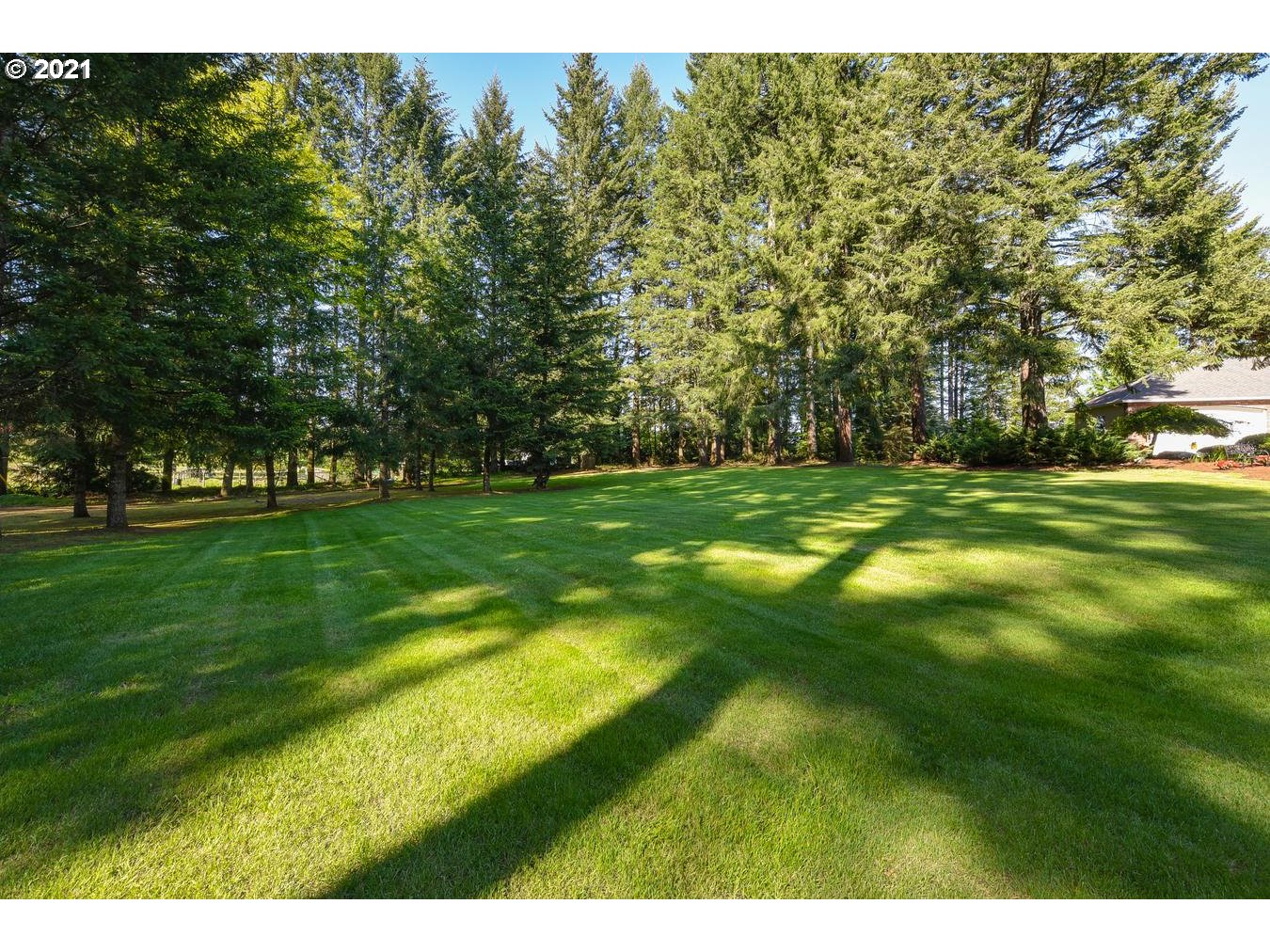 38636 Southeast Hudson Road Sandy, OR 97055 - Photo 28 of 32 a backyard of a house with lots of green space