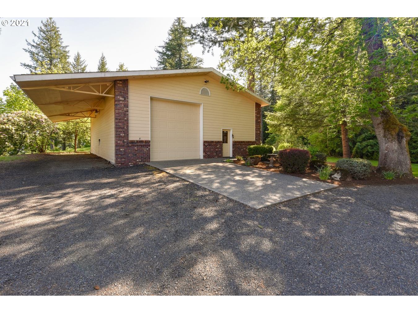 38636 Southeast Hudson Road Sandy, OR 97055 - Photo 32 of 32 a view of a house with a backyard