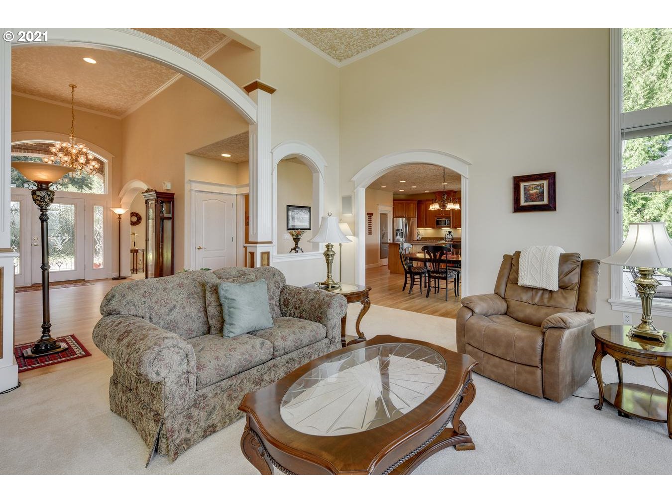 38636 Southeast Hudson Road Sandy, OR 97055 - Photo 5 of 32 a living room with furniture a rug and a large window