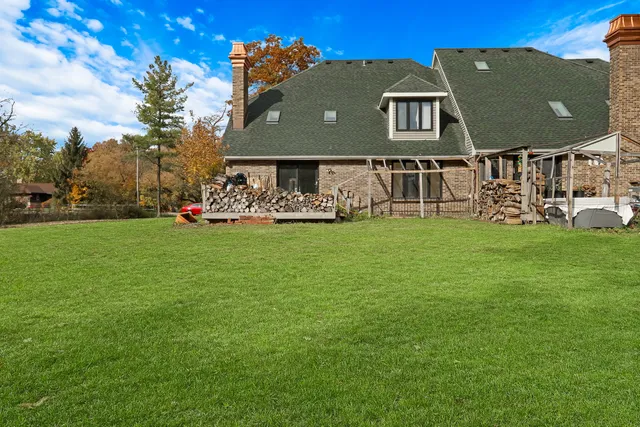 a view of a house with a big yard