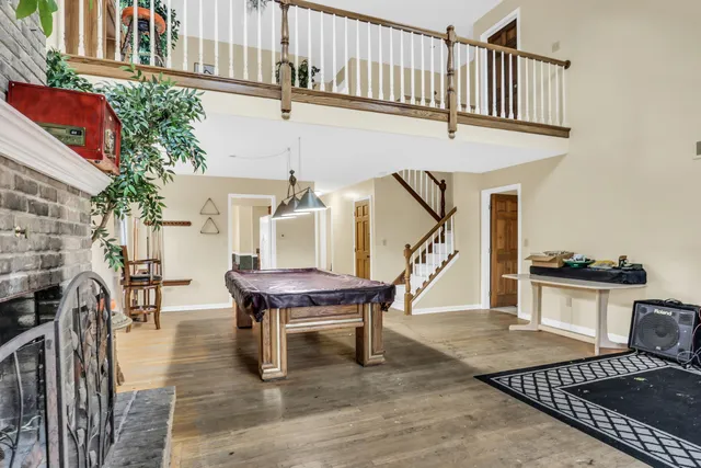 a view of entryway livingroom and hall