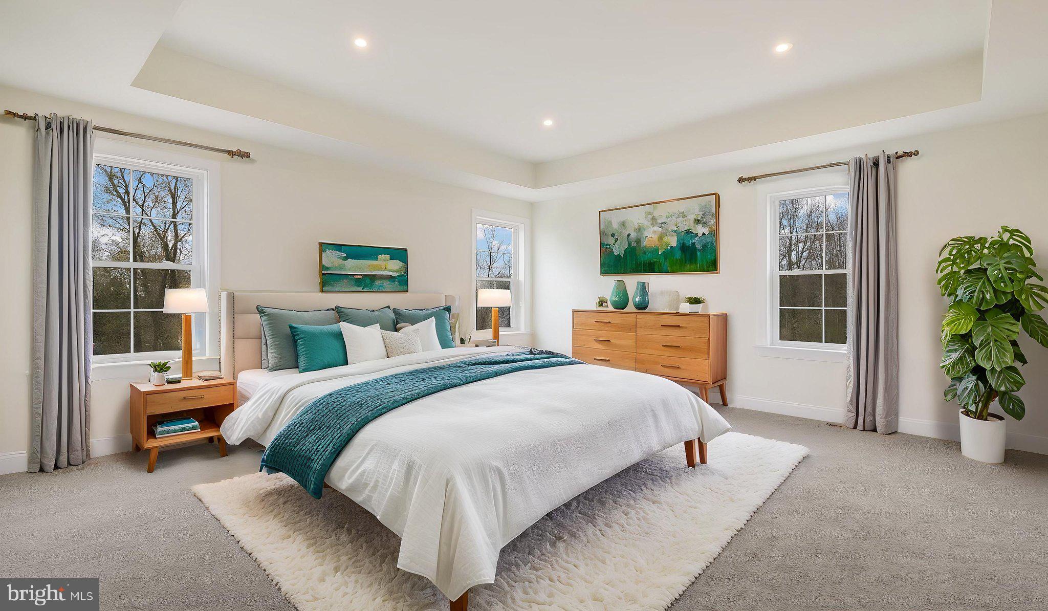 1212 Jordan Lane Perkasie, PA 18944 - Photo 25 of 40 a bedroom with a large bed and a couch