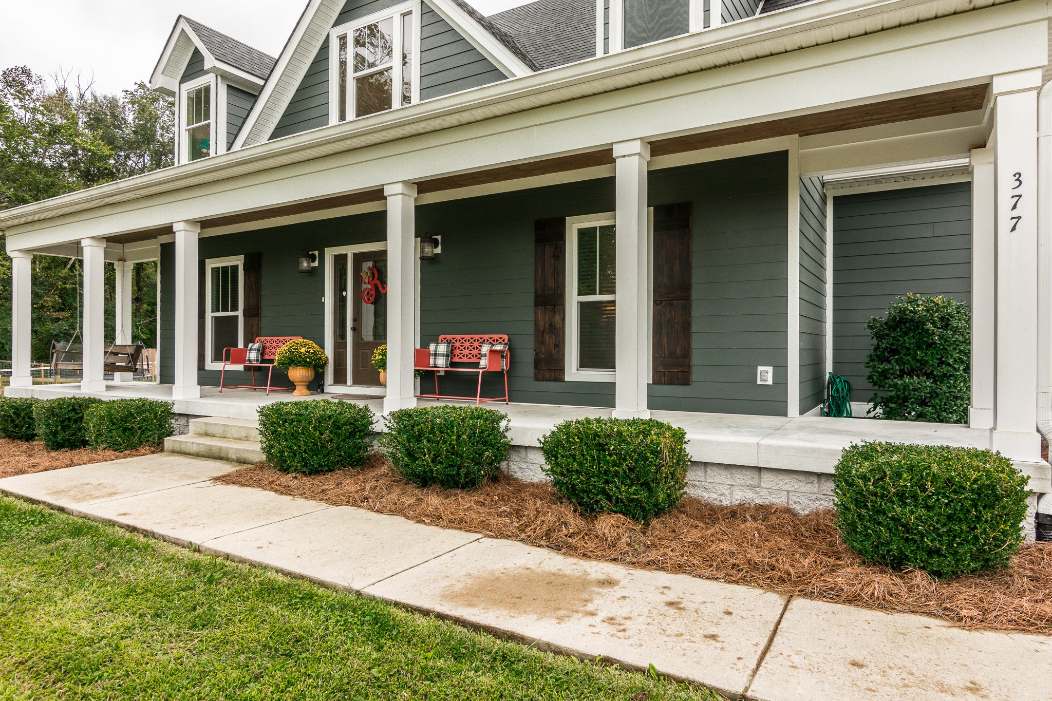 377 Tom Link Road Cottontown, TN 37048 - Photo 3 of 46 front view of a brick house with a small yard