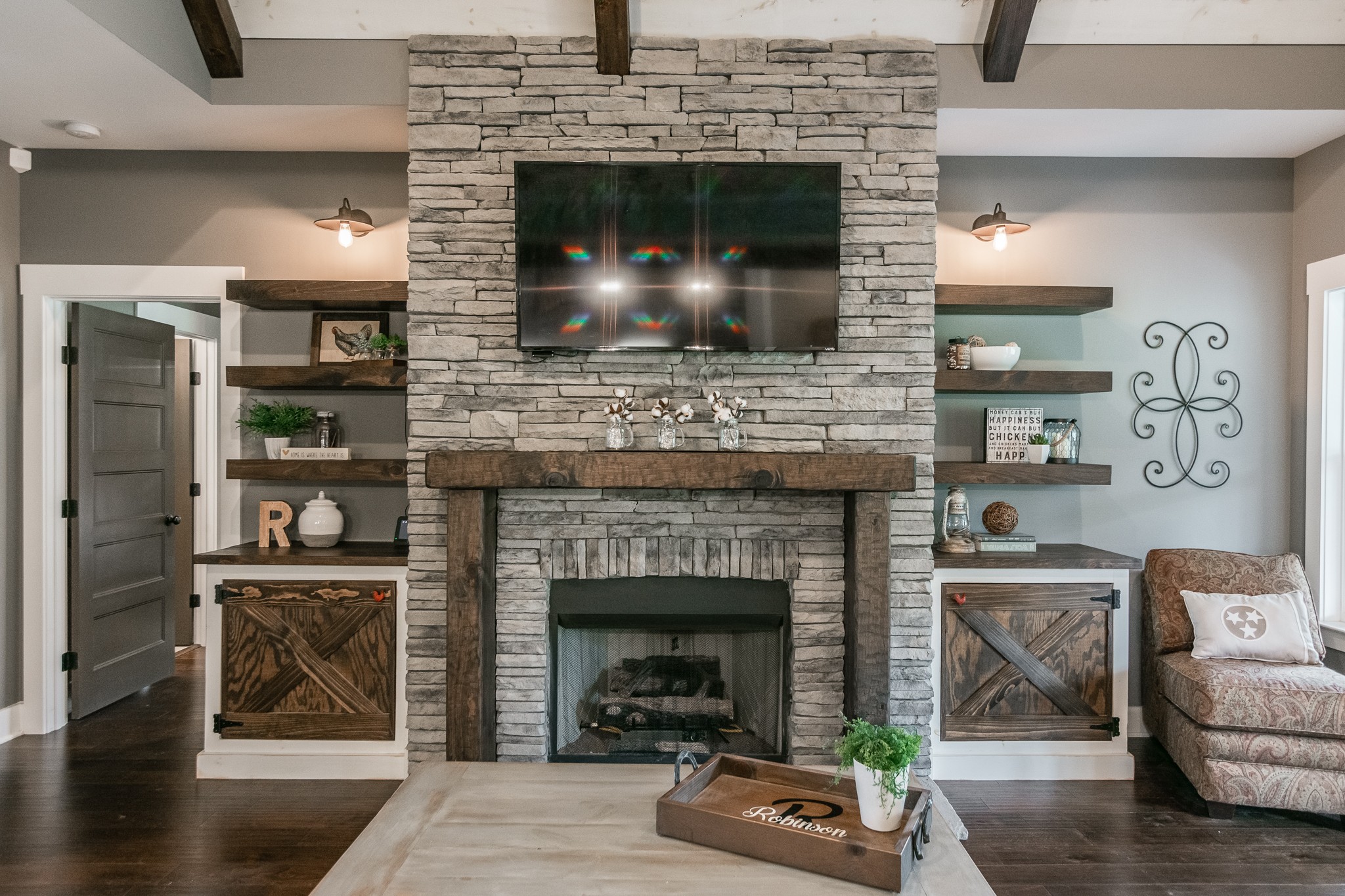 377 Tom Link Road Cottontown, TN 37048 - Photo 6 of 46 a living room with furniture and a fireplace