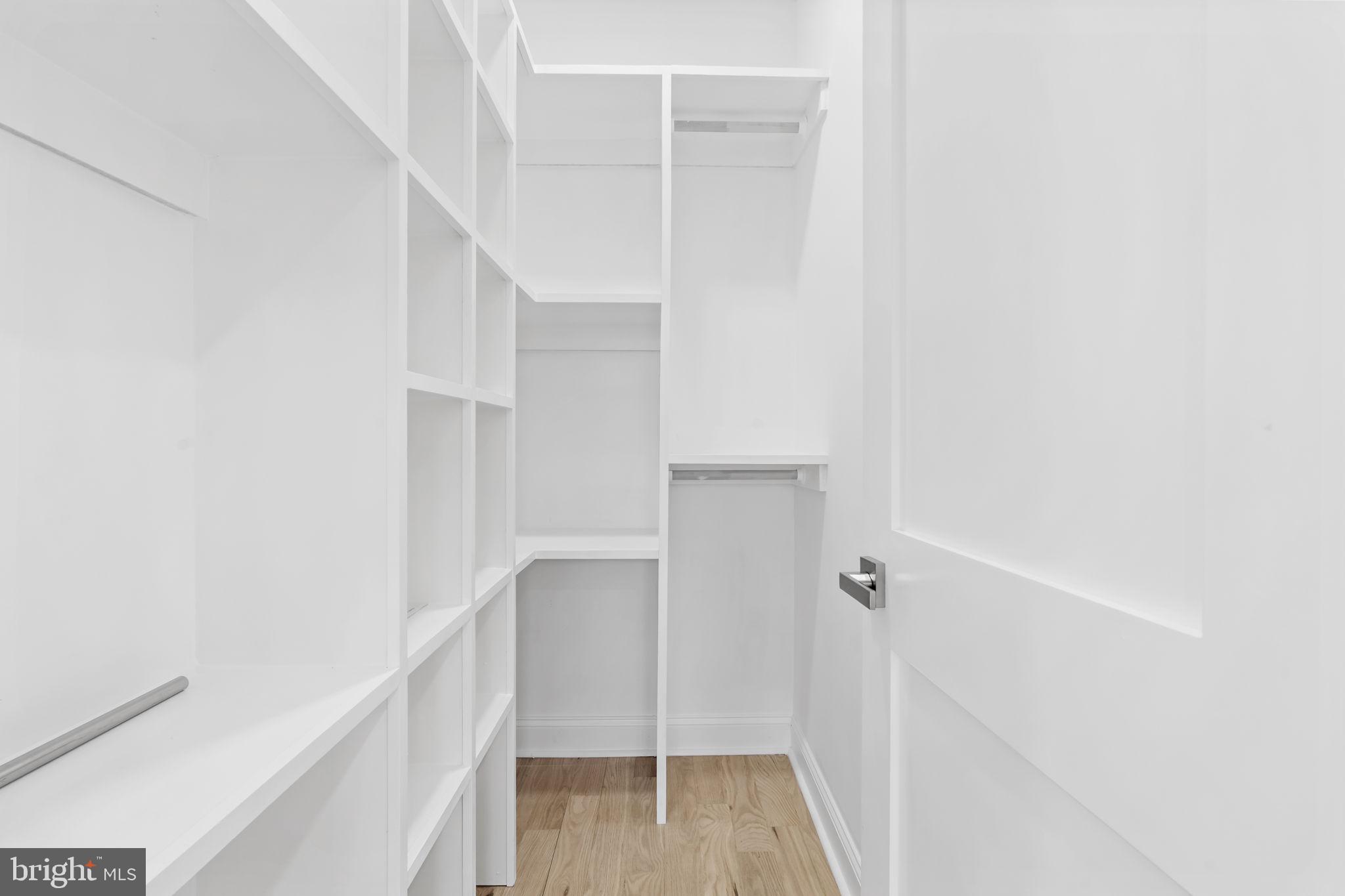 628 South 51st Street Philadelphia, PA 19143 - Photo 13 of 17 a view of walk in closet with empty racks