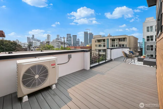 a view of roof deck with patio