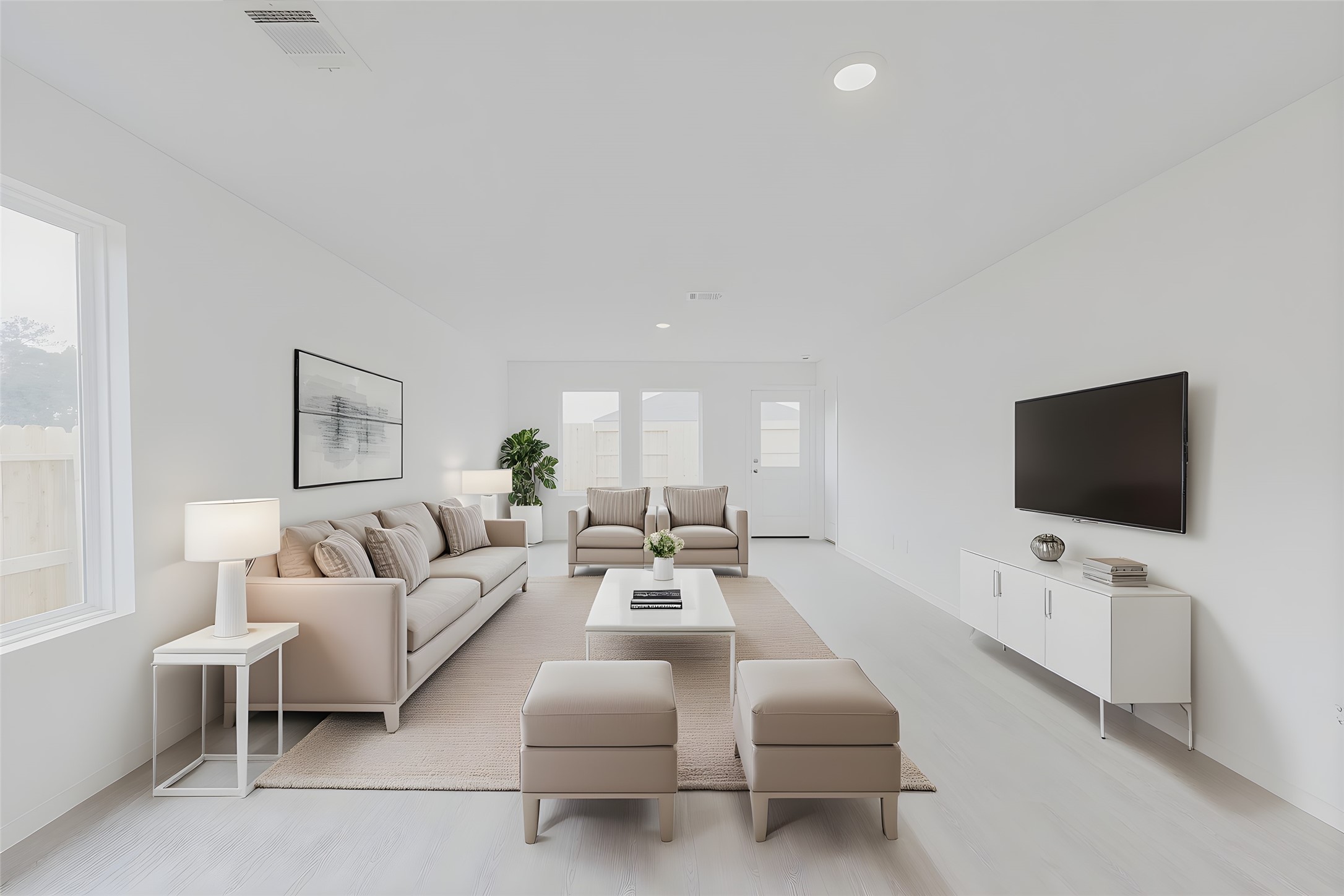 16626 Trembling Aspen Lane New Caney, TX 77357 - Photo 2 of 10 a living room with furniture and a flat screen tv