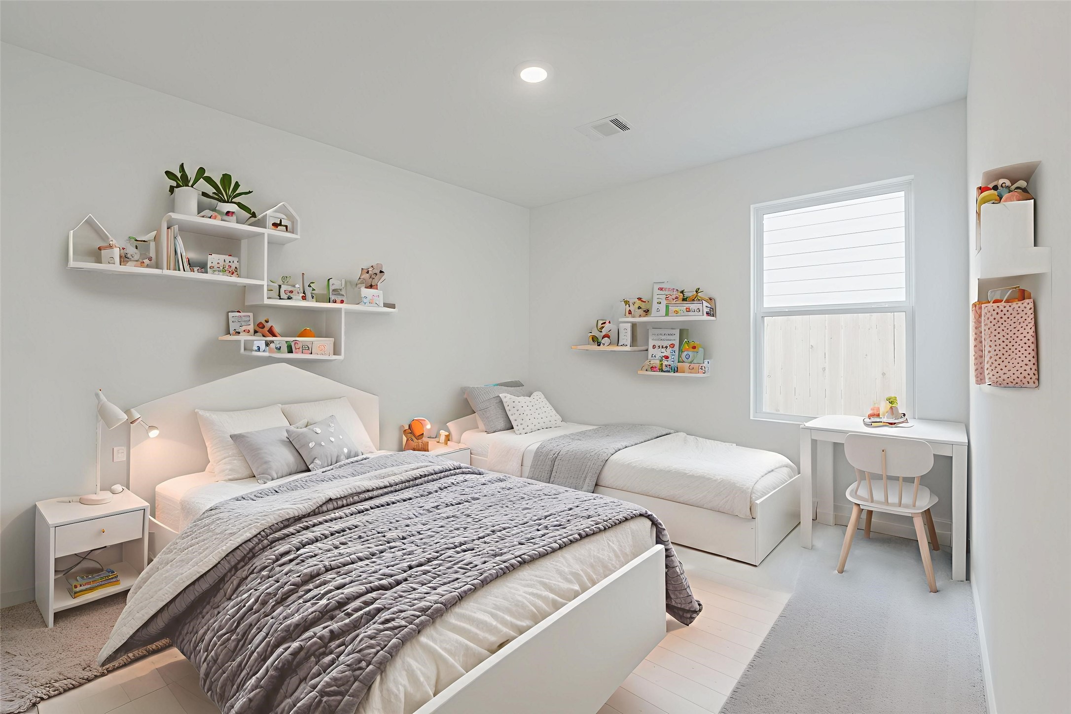 16626 Trembling Aspen Lane New Caney, TX 77357 - Photo 4 of 10 a bedroom with two beds and a table chair