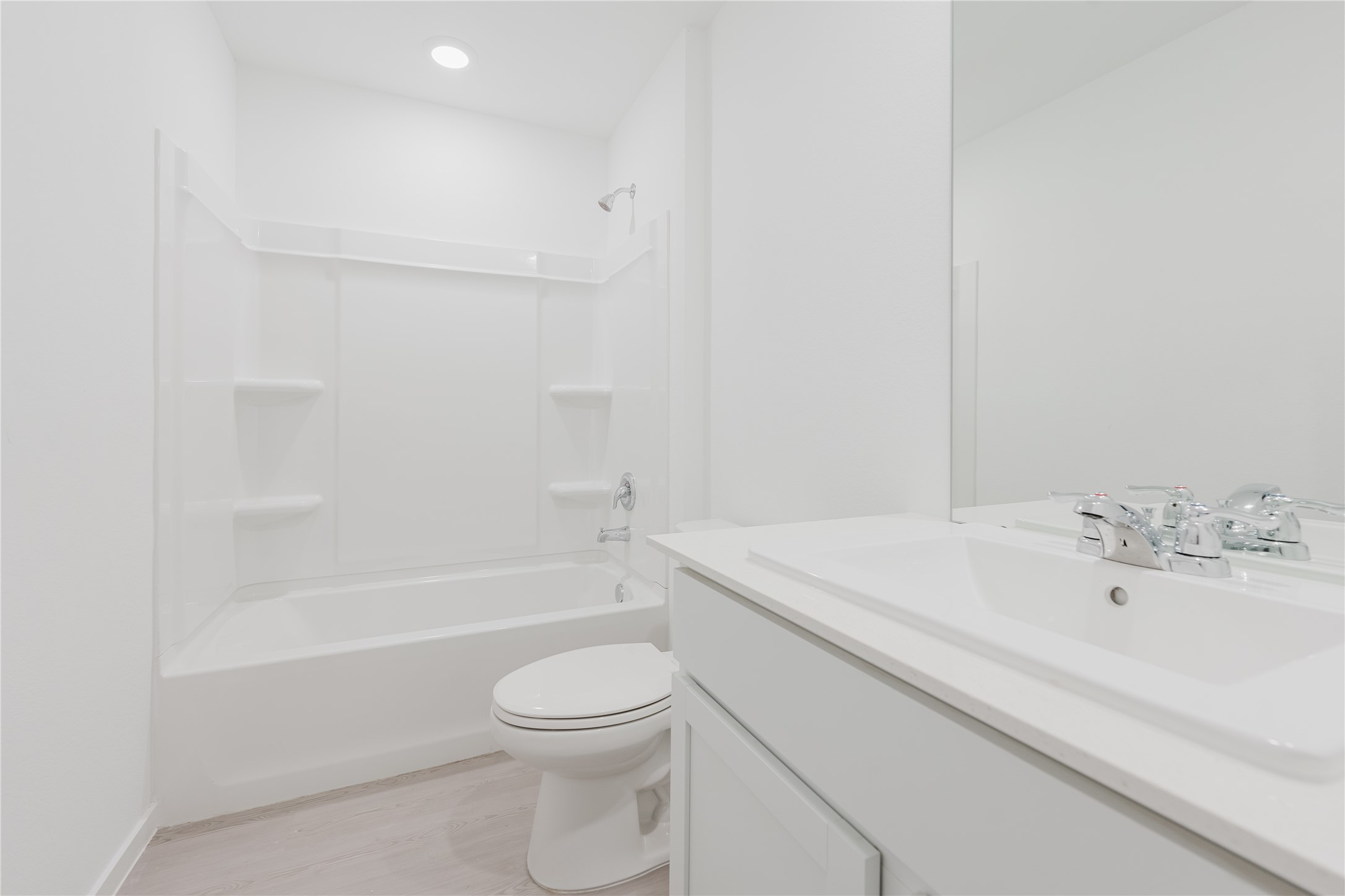 16626 Trembling Aspen Lane New Caney, TX 77357 - Photo 8 of 10 a bathroom with a sink a toilet and bathtub