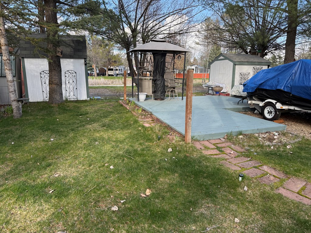 7 H Street, Unit 15 Cascade, ID 83611 - Photo 4 of 14 Grassy Area with Sprinkler System