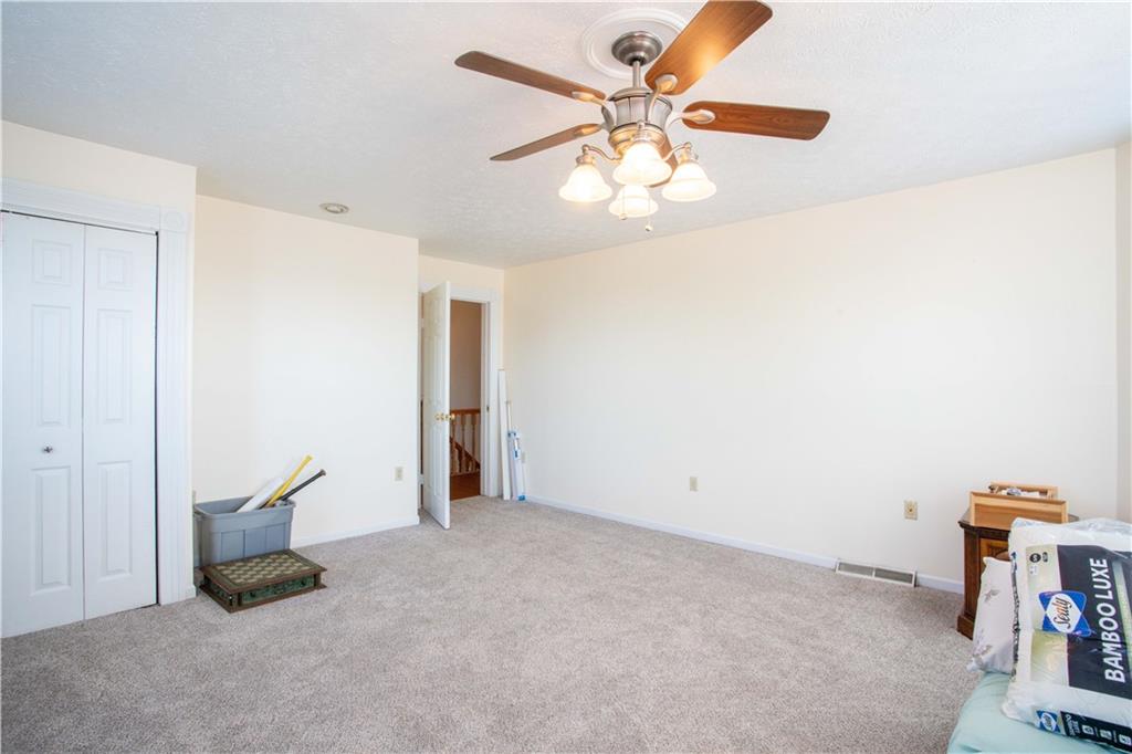 166 Pennsylvania Avenue Rochester, PA 15074 - Photo 20 of 30 an empty room with windows and fan