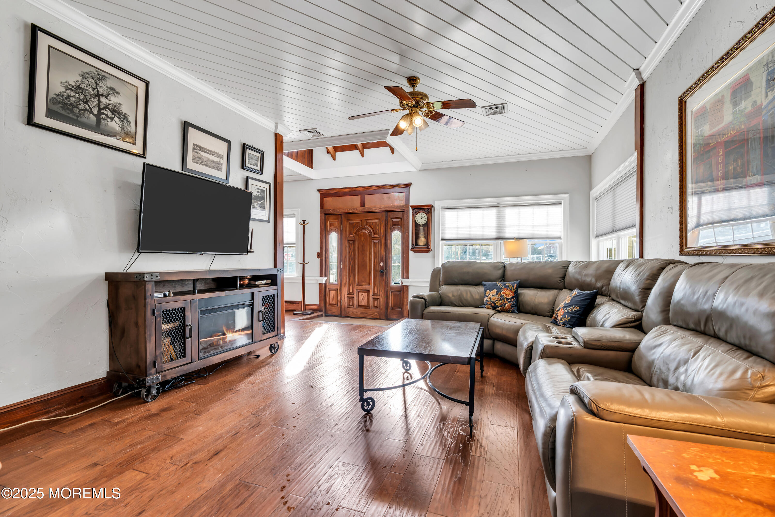 162 East River Road Rumson, NJ 07760 - Photo 14 of 70 a living room with furniture and a flat screen tv