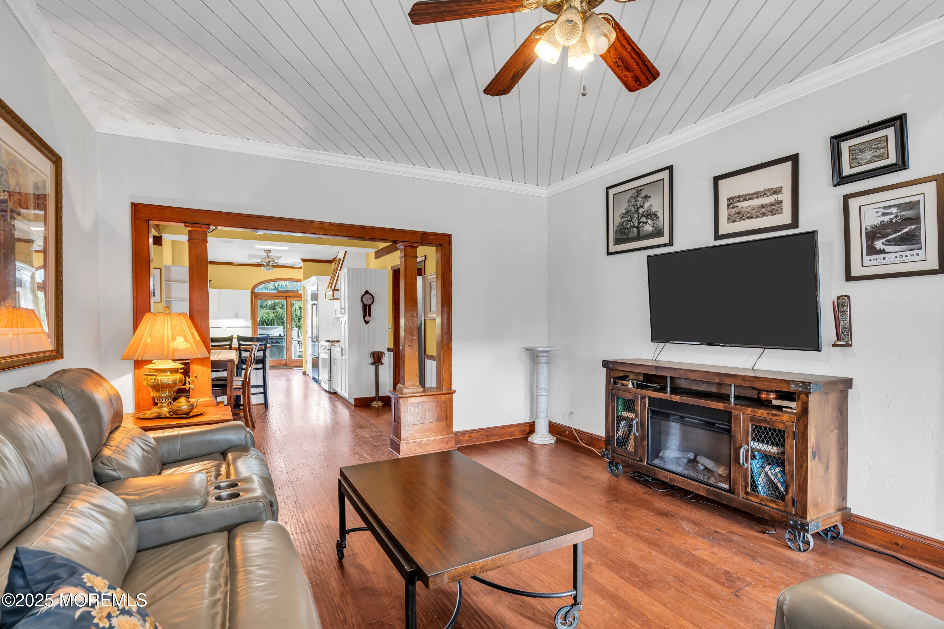 162 East River Road Rumson, NJ 07760 - Photo 17 of 70 a living room with furniture and a flat screen tv