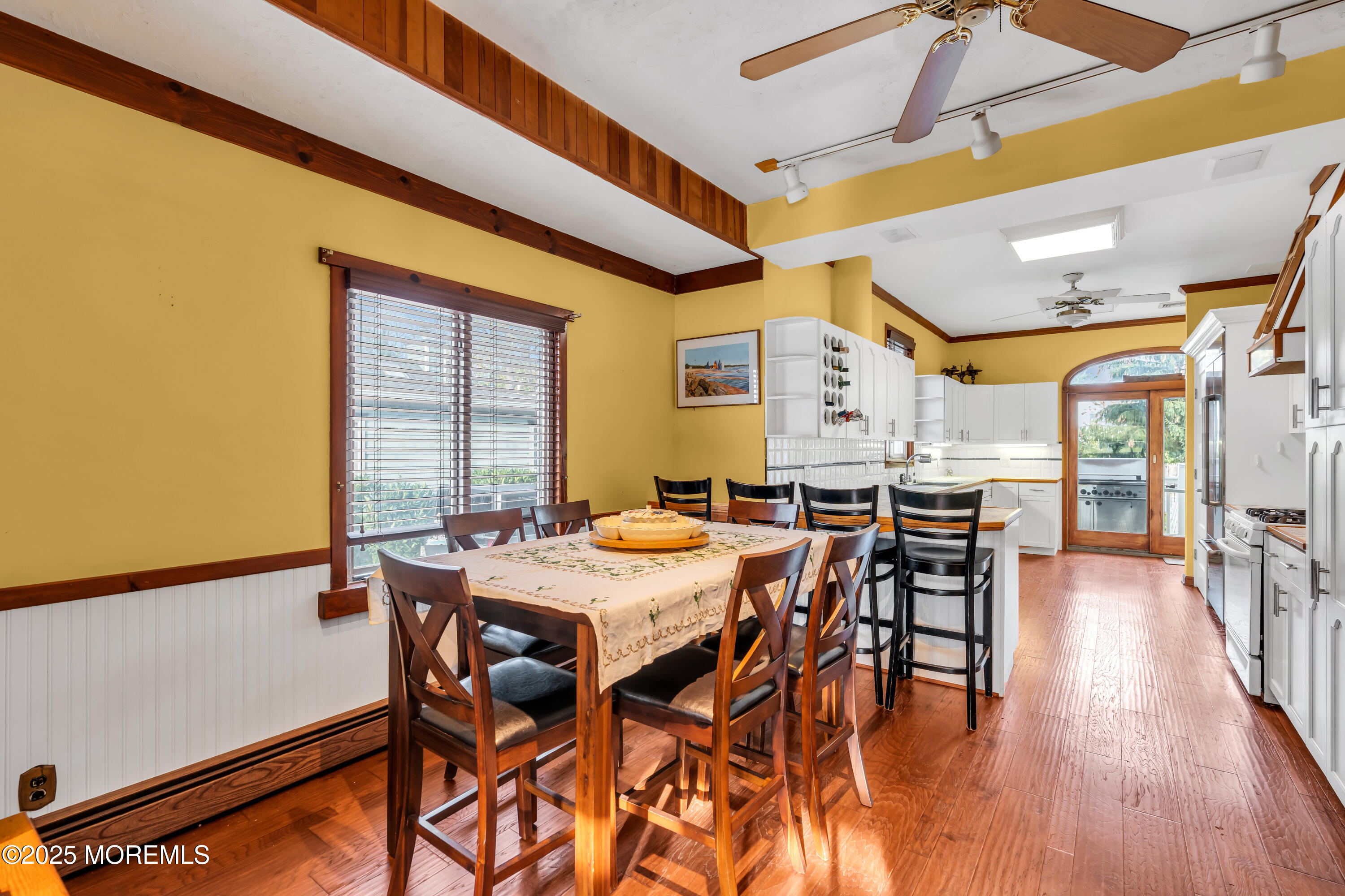 162 East River Road Rumson, NJ 07760 - Photo 19 of 70 a view of a dining room with furniture and wooden floor