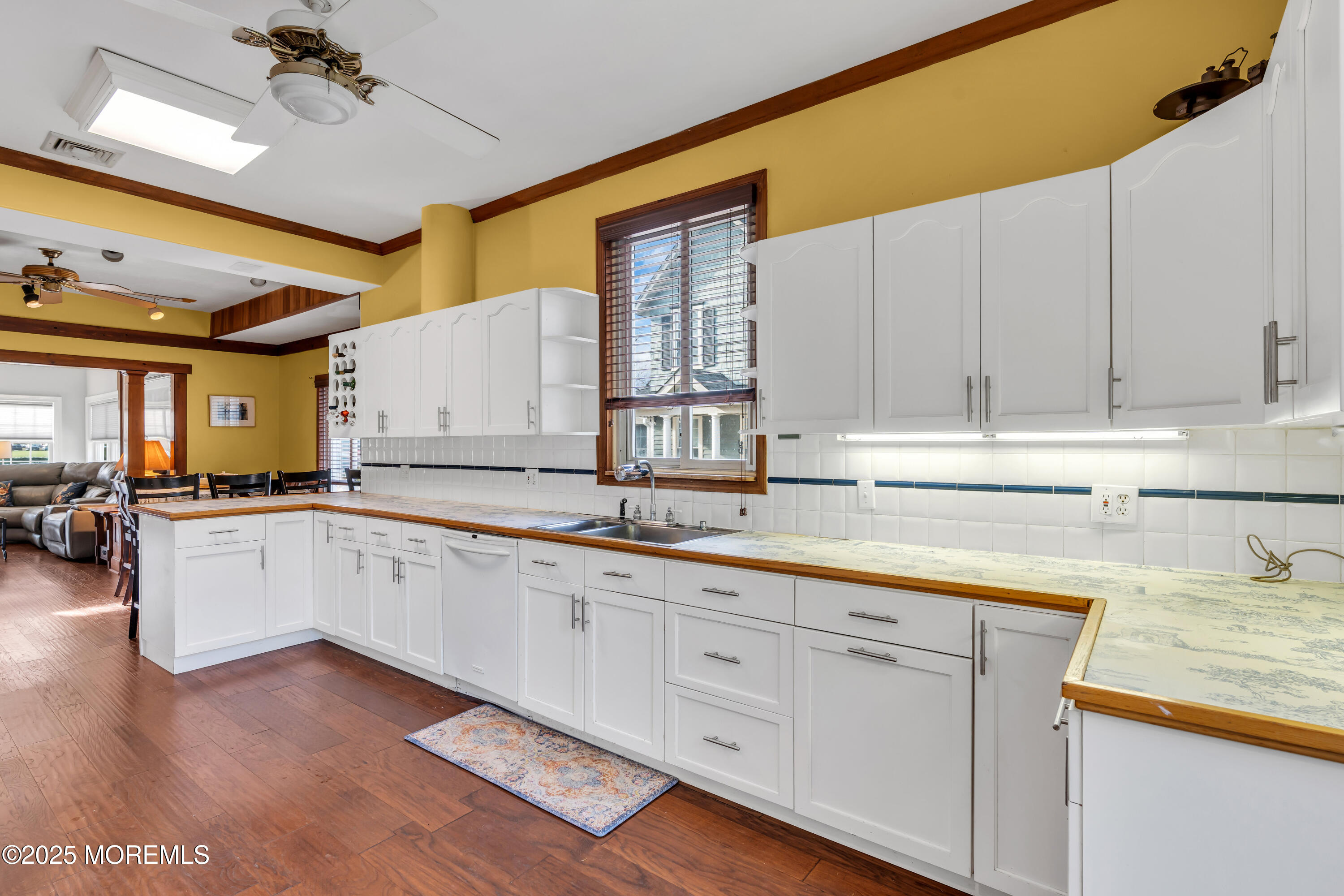 162 East River Road Rumson, NJ 07760 - Photo 23 of 70 a kitchen with sink cabinets and window
