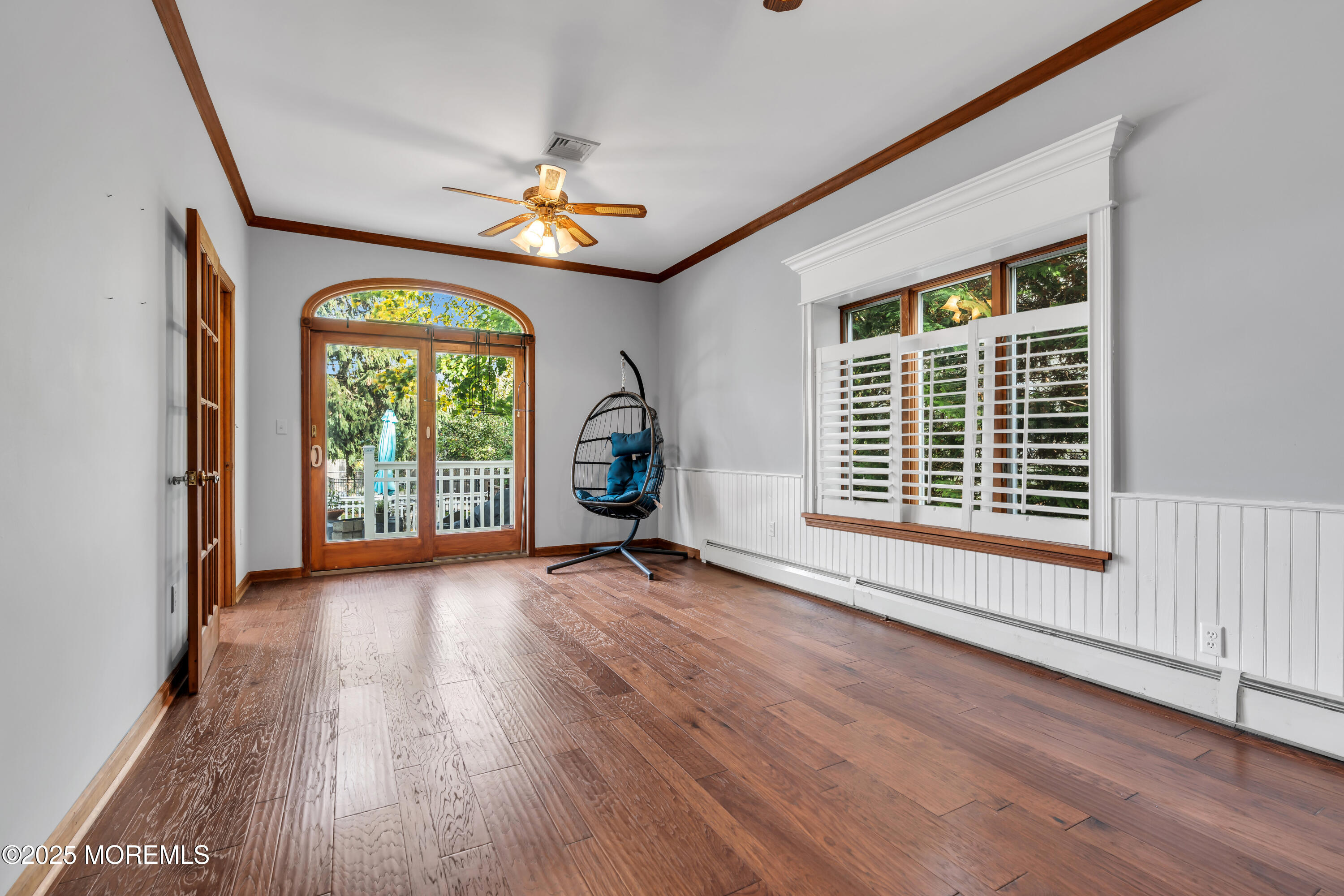 162 East River Road Rumson, NJ 07760 - Photo 27 of 70 a view of an empty room with a window and wooden floor