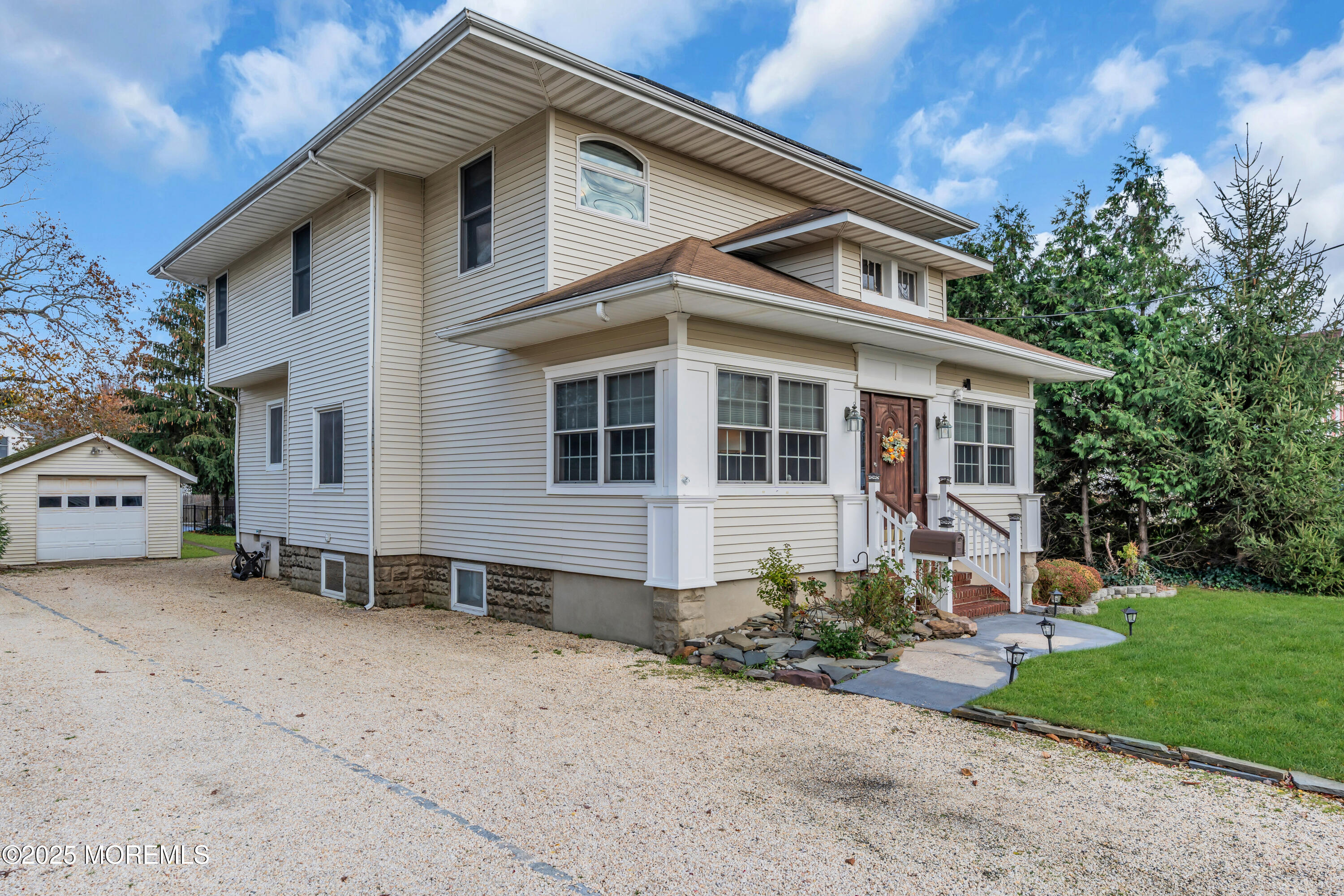 162 East River Road Rumson, NJ 07760 - Photo 48 of 70 a front view of a house with a yard