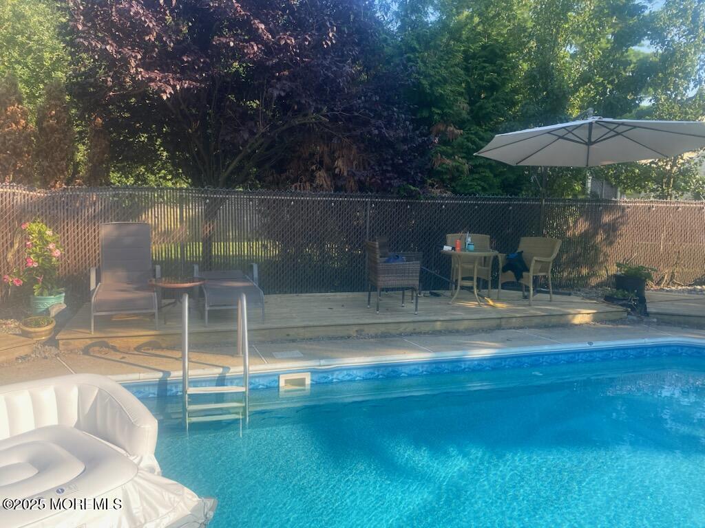 162 East River Road Rumson, NJ 07760 - Photo 58 of 70 a view of a lake with a patio