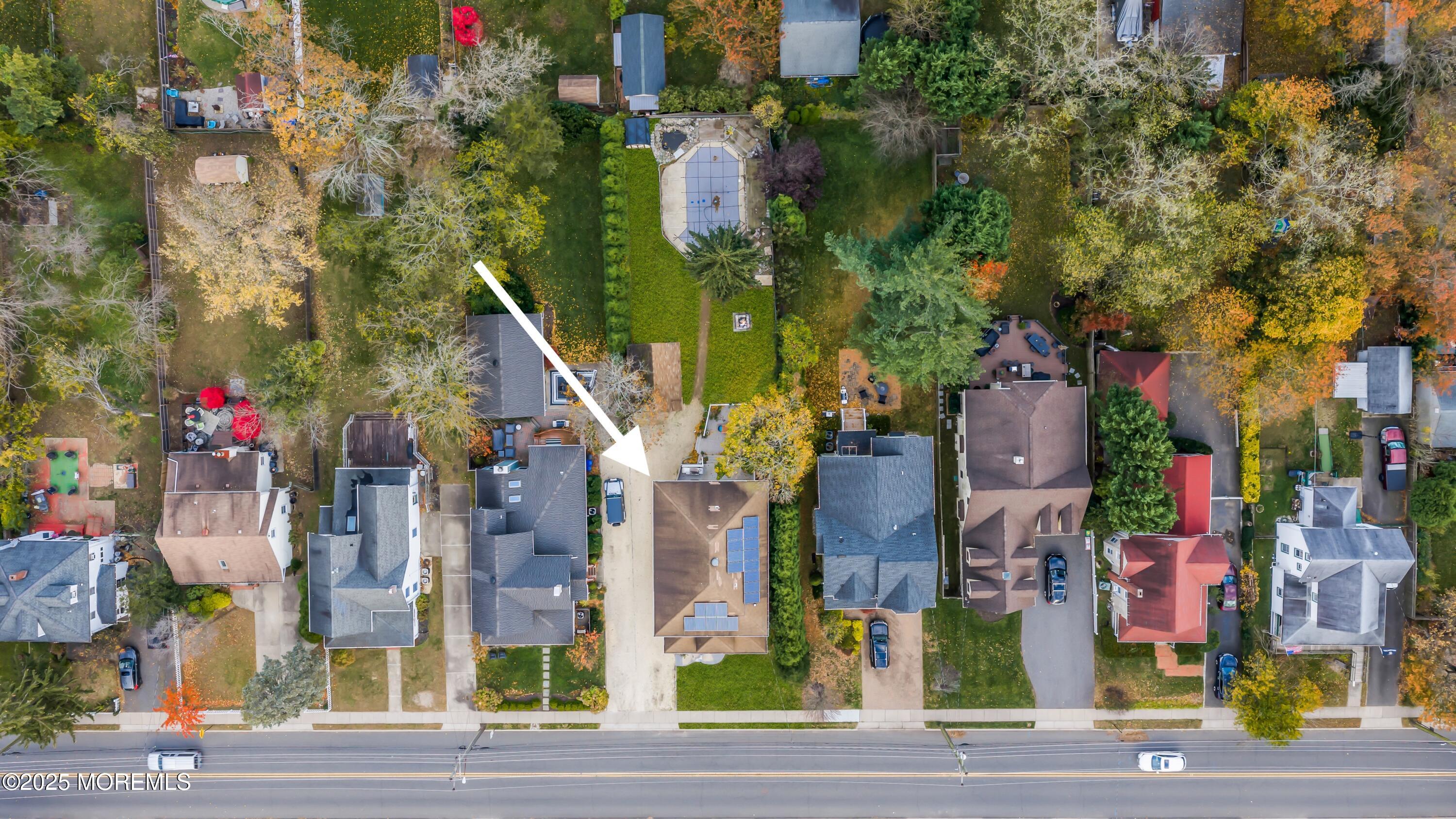 162 East River Road Rumson, NJ 07760 - Photo 6 of 70 a city street lined with buildings and trees