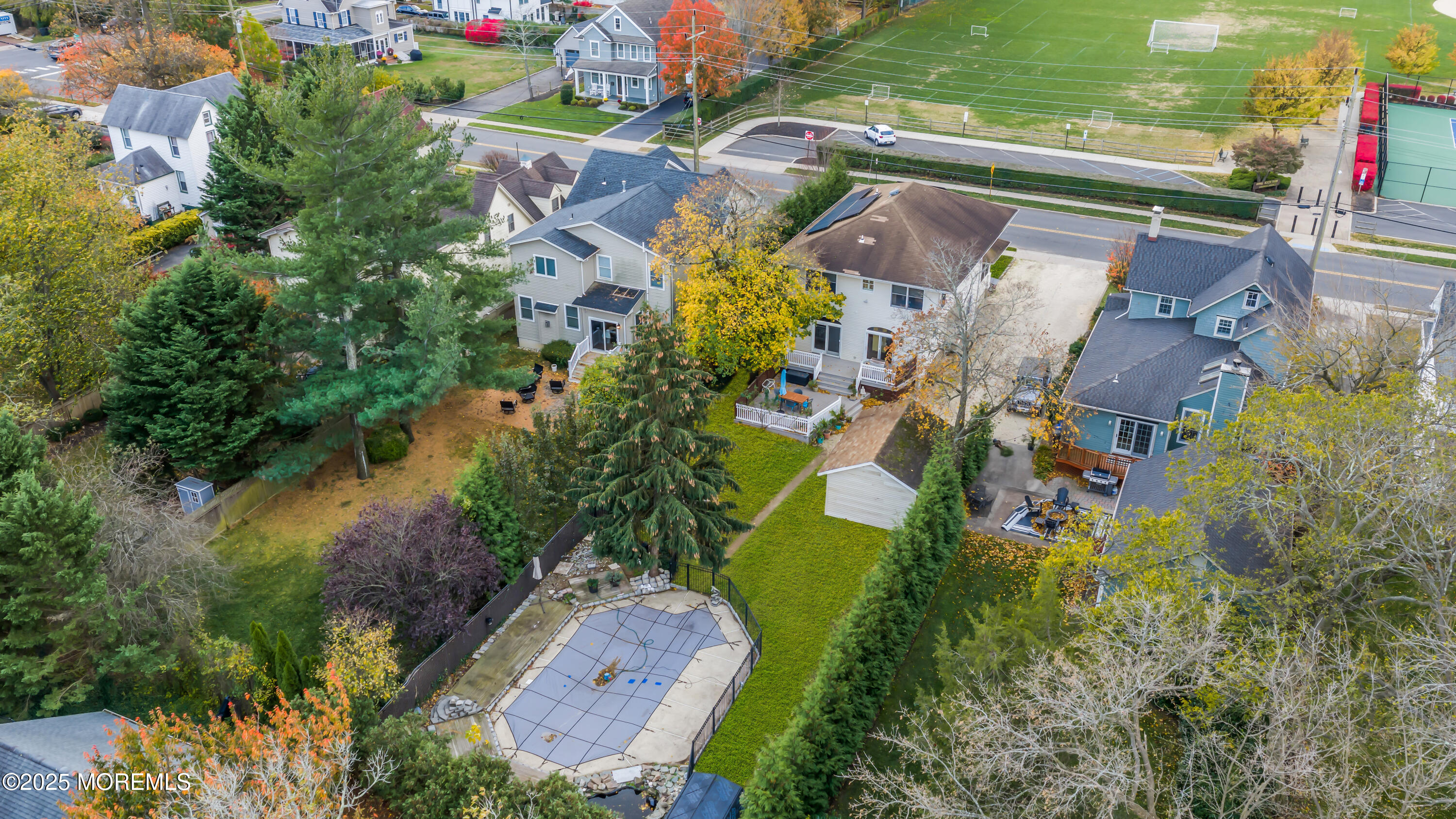 162 East River Road Rumson, NJ 07760 - Photo 7 of 70 an aerial view of residential houses with outdoor space and trees