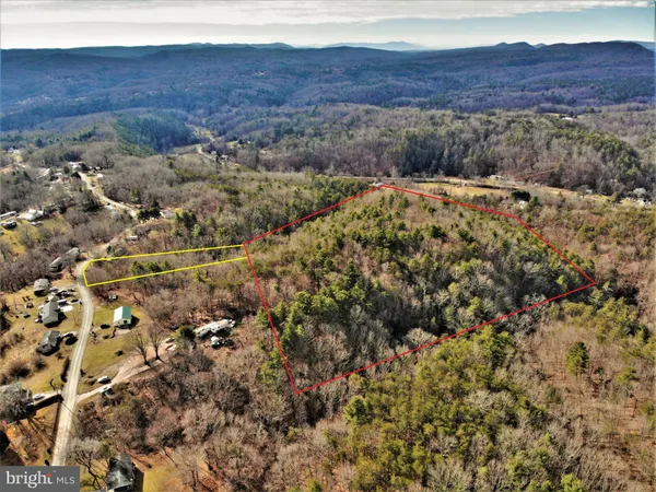 a view of mountain and an ocean