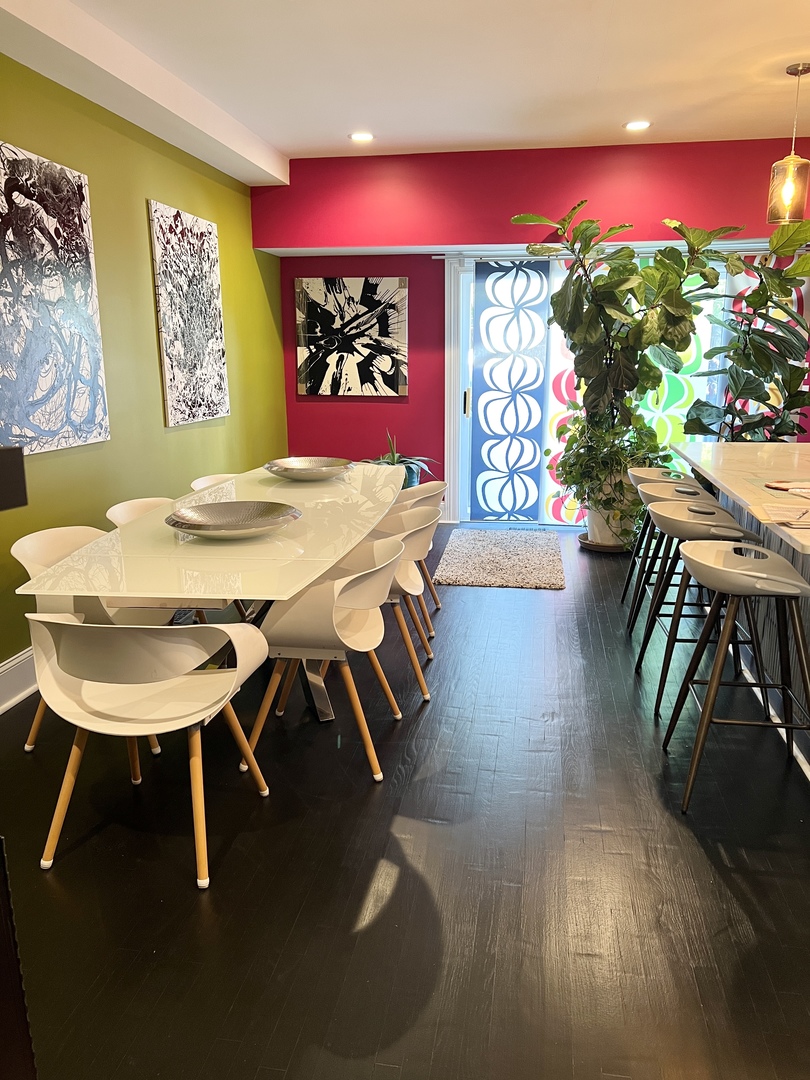 7019 South Union Avenue Chicago, IL 60621 - Photo 7 of 10 a view of a dining room with furniture and wooden floor