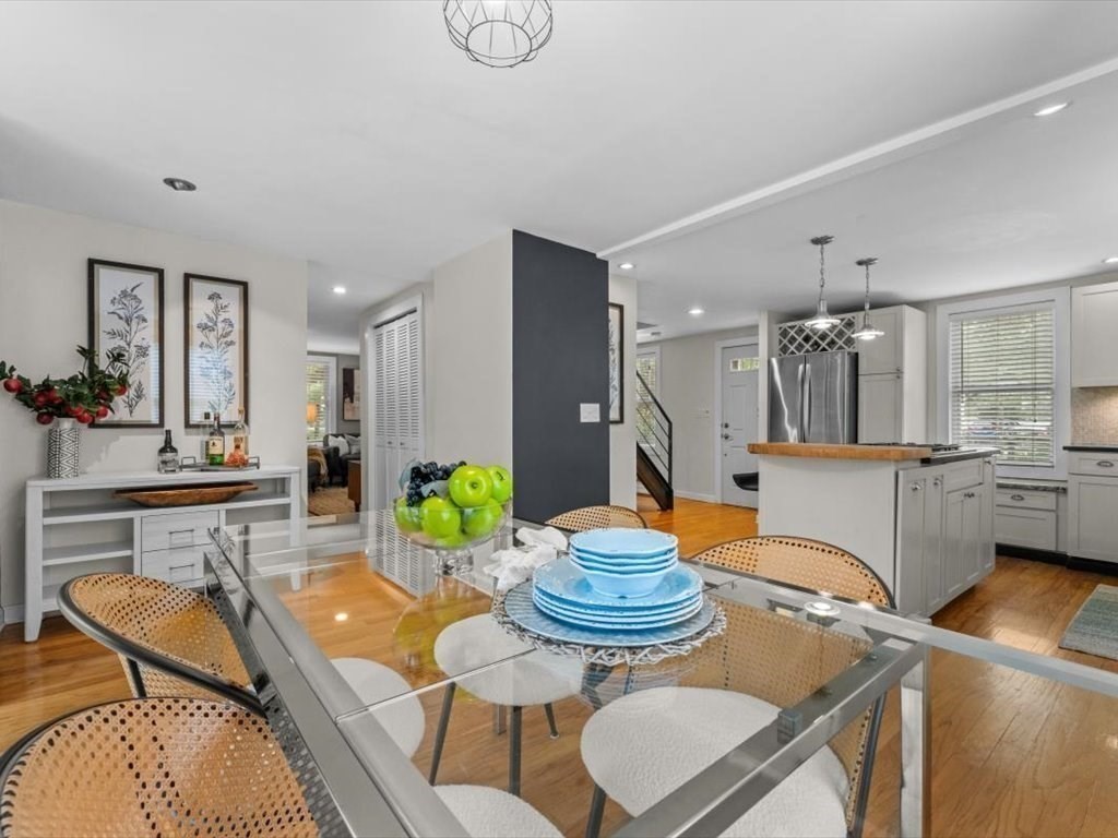 39 Evergreen Road Natick, MA 01760 - Photo 13 of 36 a kitchen with a table and chairs in it
