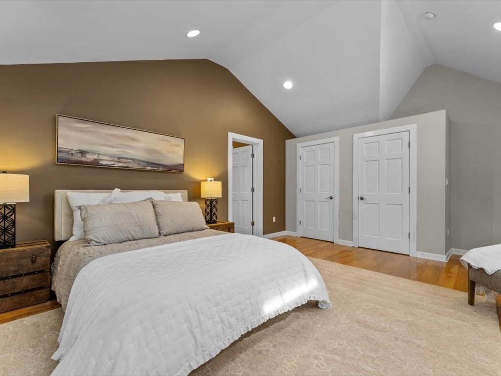 39 Evergreen Road Natick, MA 01760 - Photo 20 of 36 a bedroom with a bed and a painting