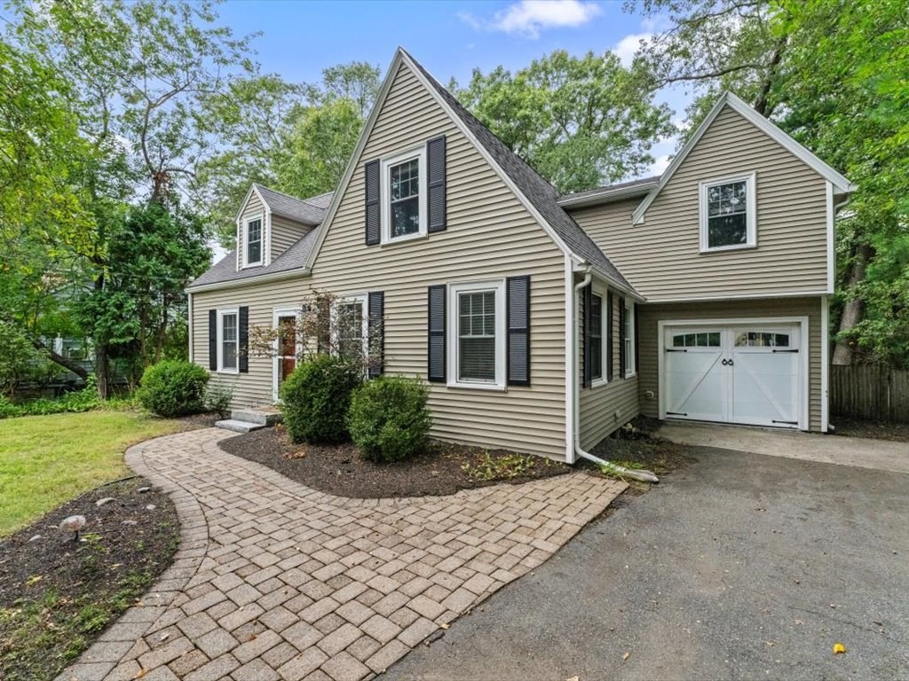 39 Evergreen Road Natick, MA 01760 - Photo 2 of 36 a front view of a house with a yard