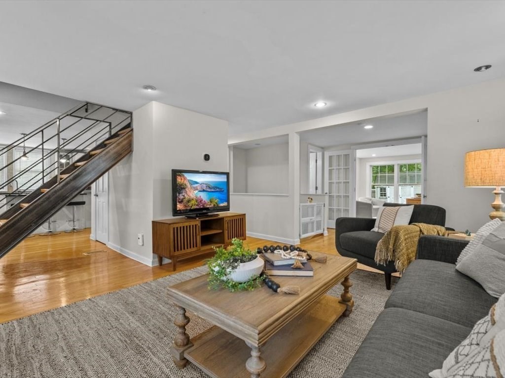 39 Evergreen Road Natick, MA 01760 - Photo 5 of 36 a living room with furniture and a flat screen tv