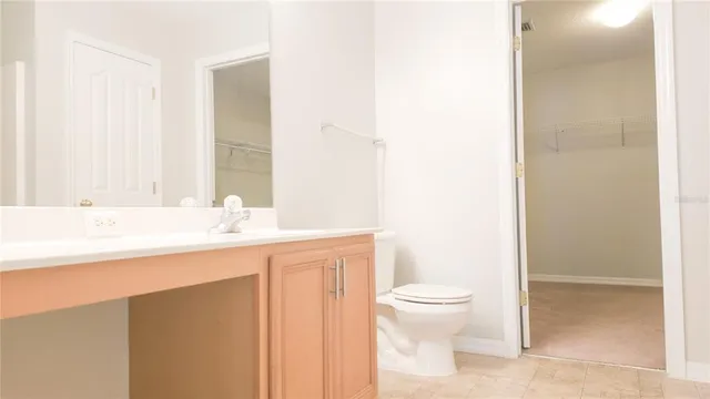 a bathroom with a tub and sink