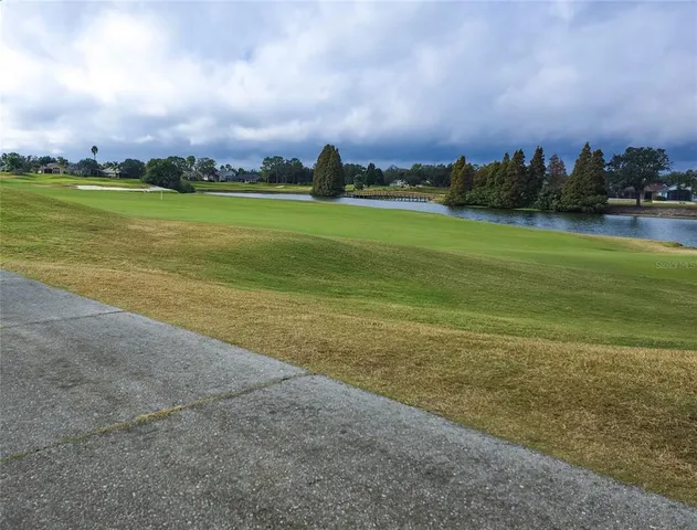a view of a backyard of the house