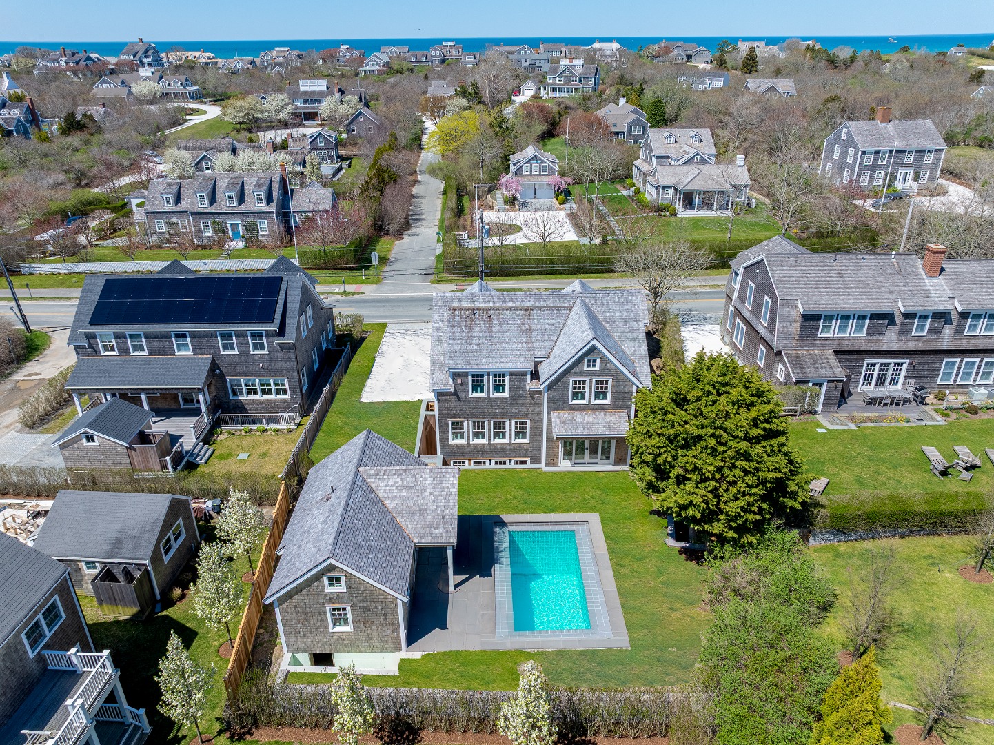 84 Cliff Road Nantucket, MA 02554 - Photo 3 of 12 an aerial view of multiple houses with yard