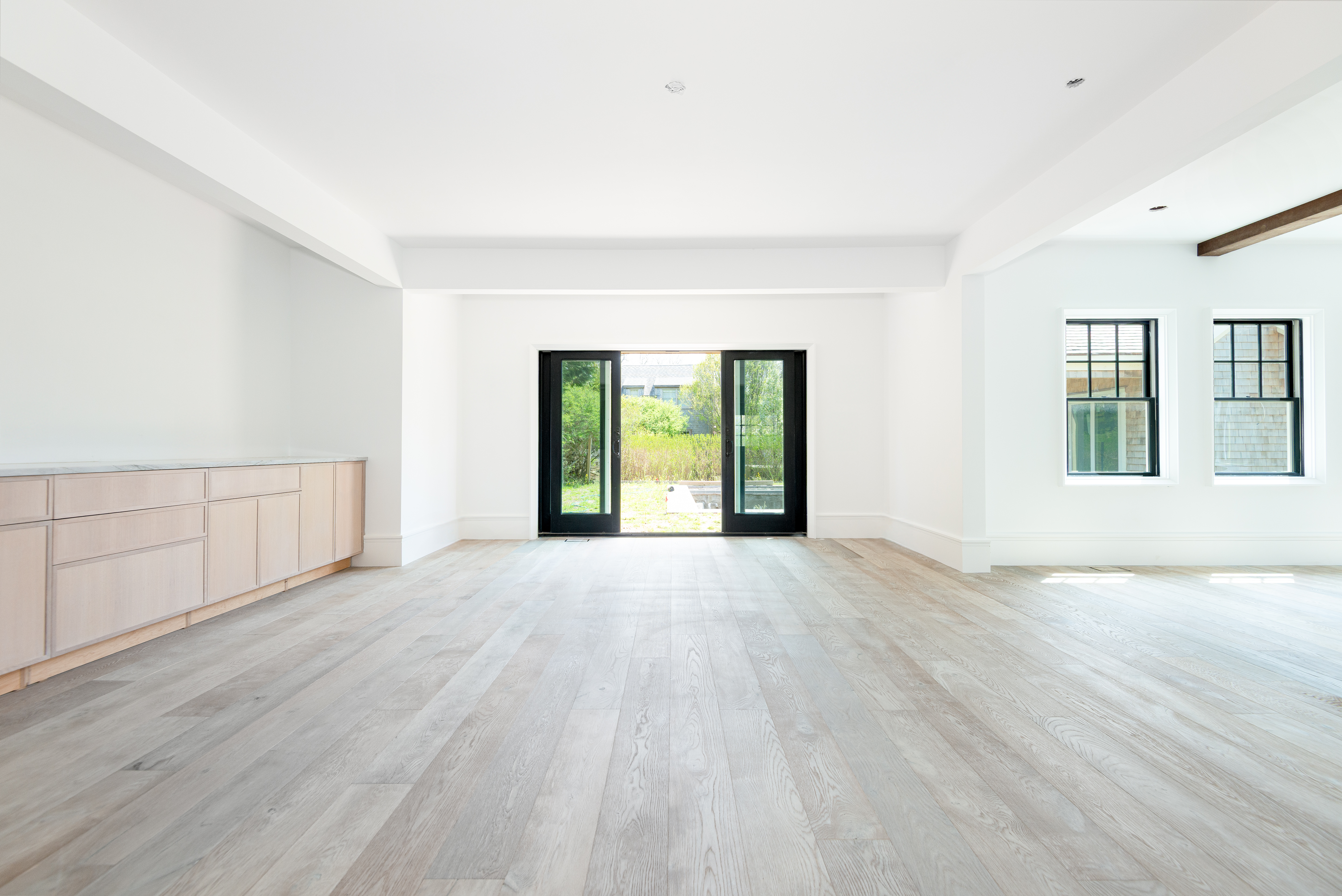 84 Cliff Road Nantucket, MA 02554 - Photo 9 of 12 a view of an empty room with wooden floor and a window