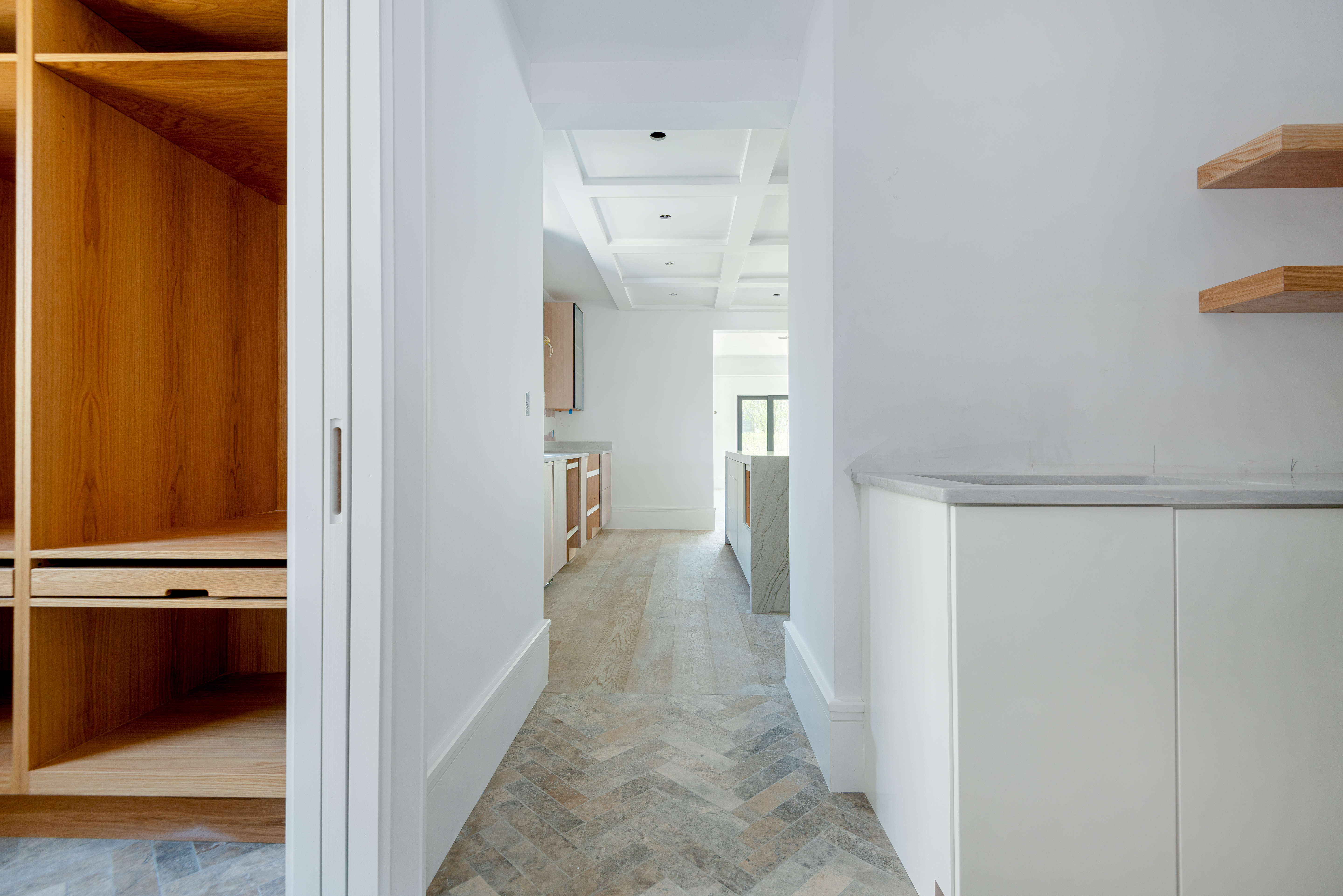 84 Cliff Road Nantucket, MA 02554 - Photo 10 of 12 a view of a hallway with wooden floor and closet