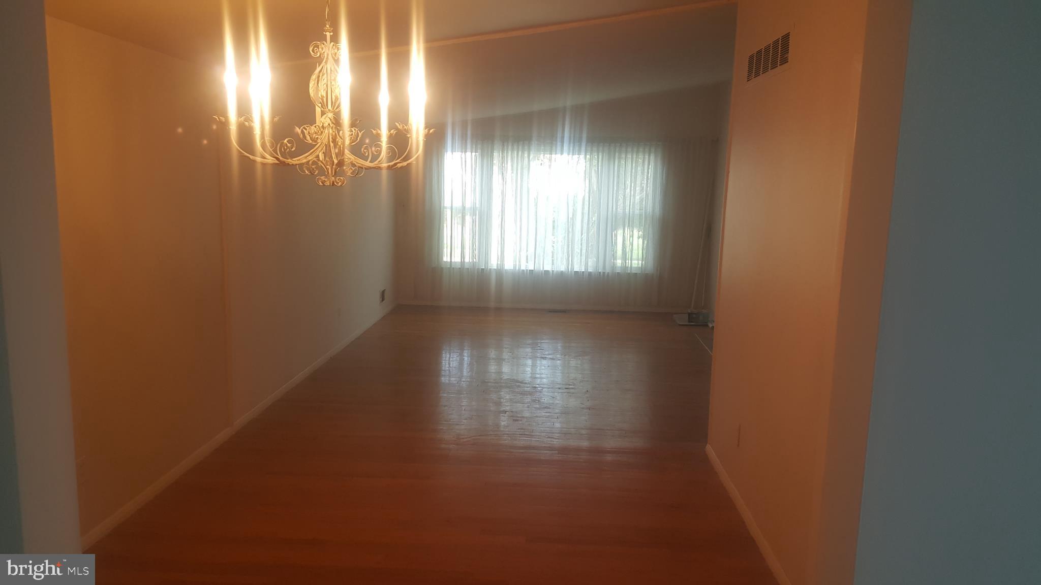 3428 Edcrest Road Baltimore, MD 21244 - Photo 3 of 19 a view of empty room with window
